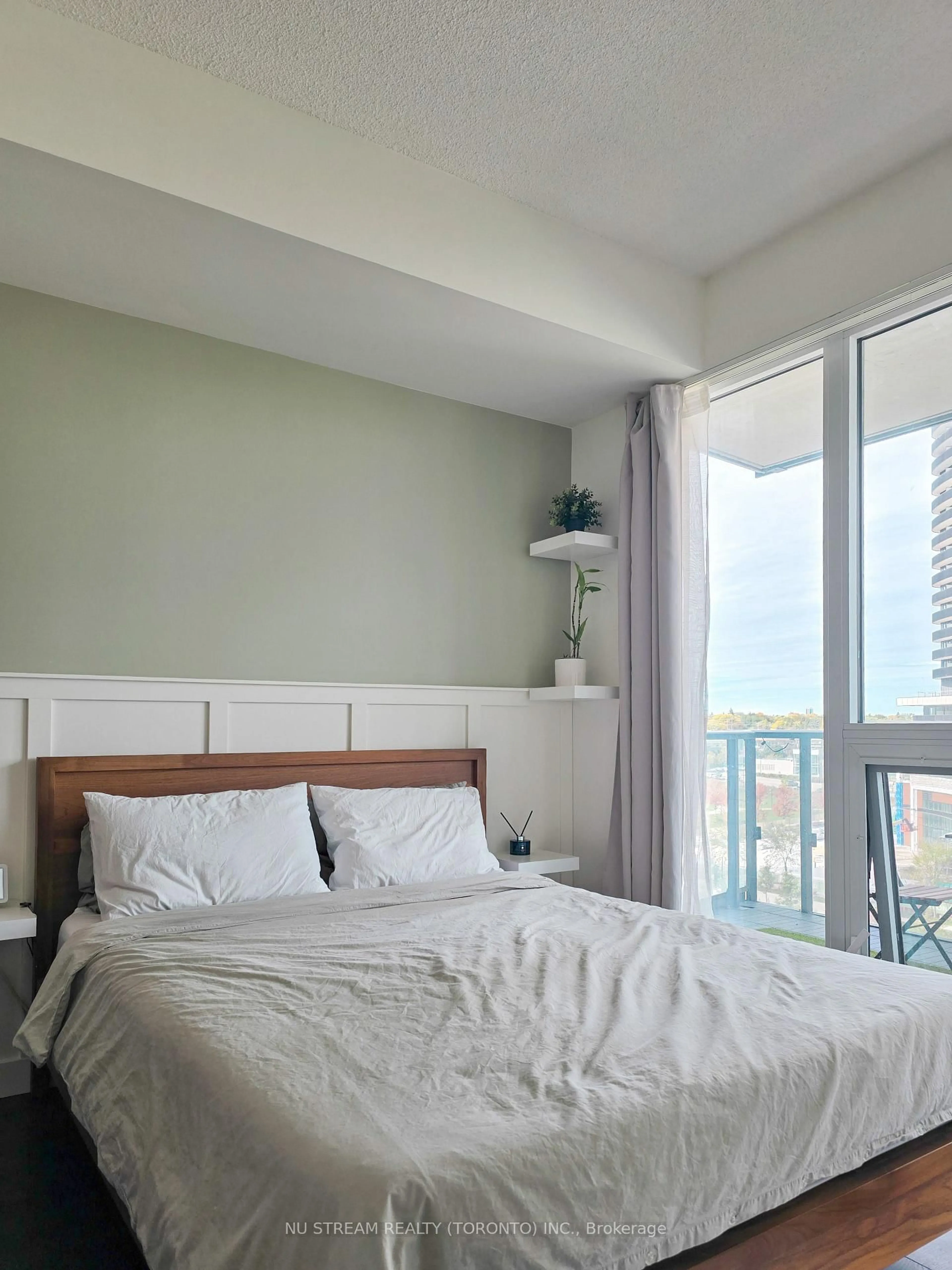 Bedroom with bed, wood/laminate floor for 95 Mcmahon Dr #810, Toronto Ontario M2K 0H2