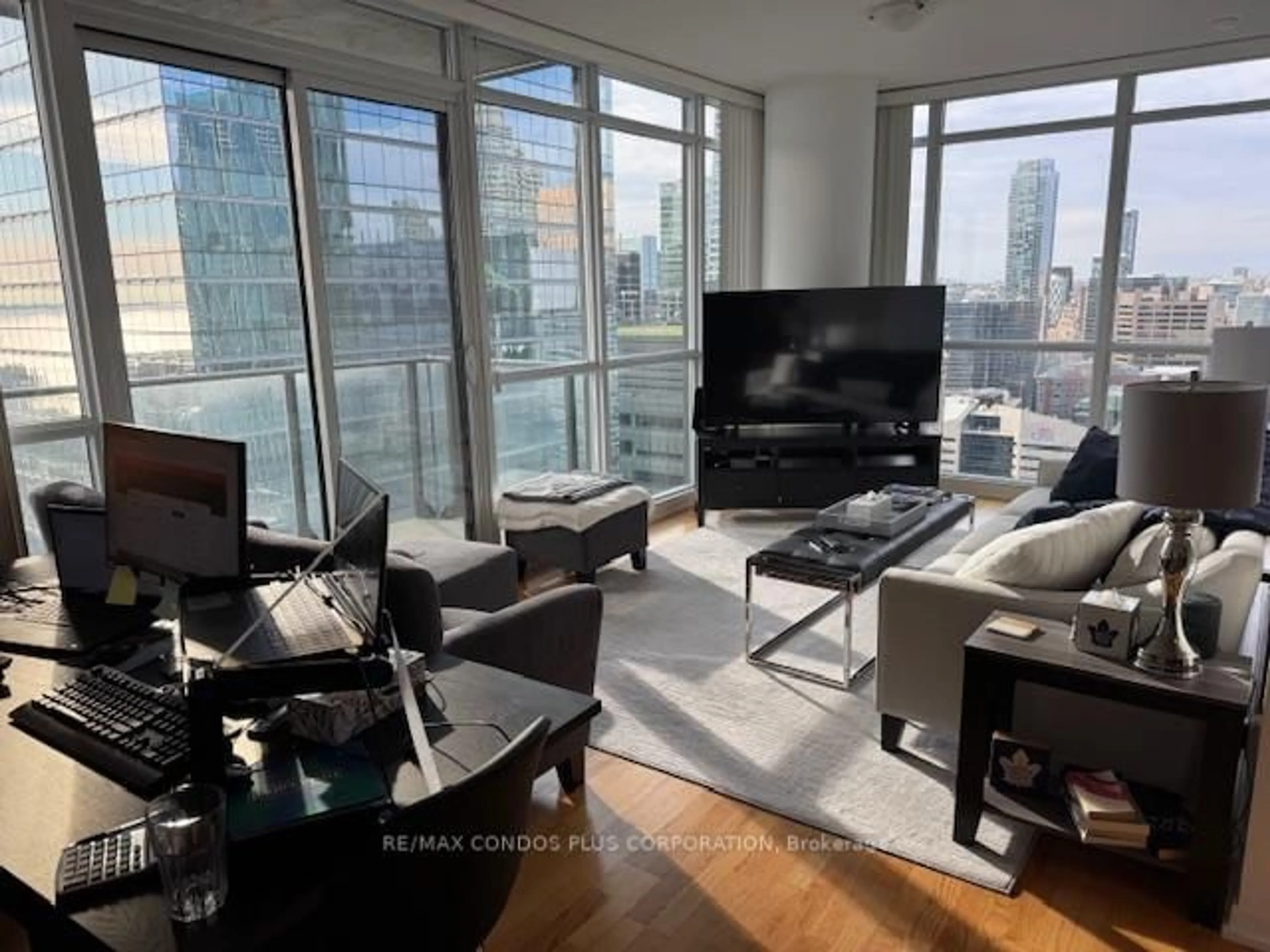Living room with furniture, unknown for 55 Bremner Blvd #3901, Toronto Ontario M5J 0A6