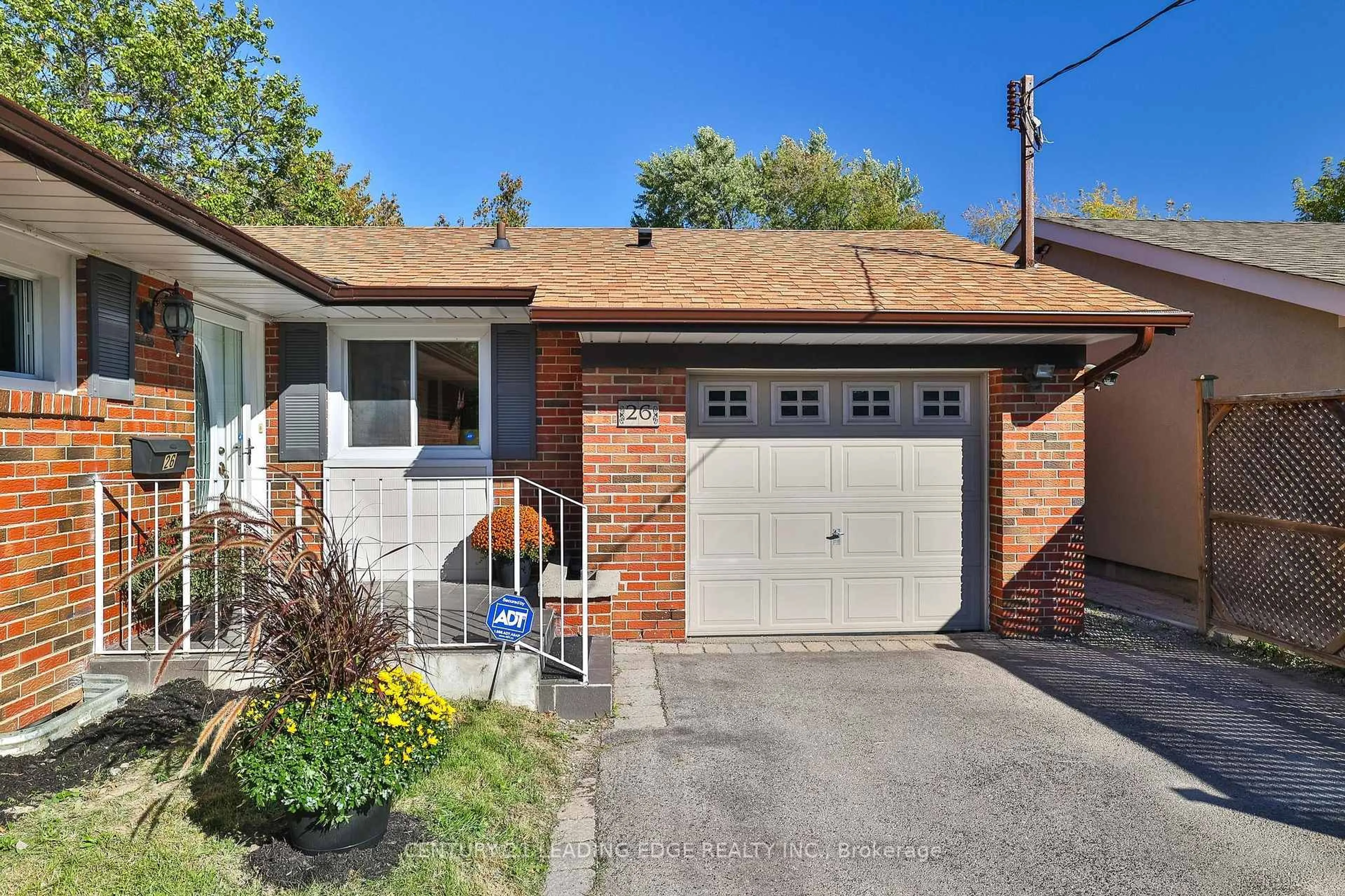 Home with brick exterior material, street for 26 ELVASTON Dr, Toronto Ontario M4A 1M9