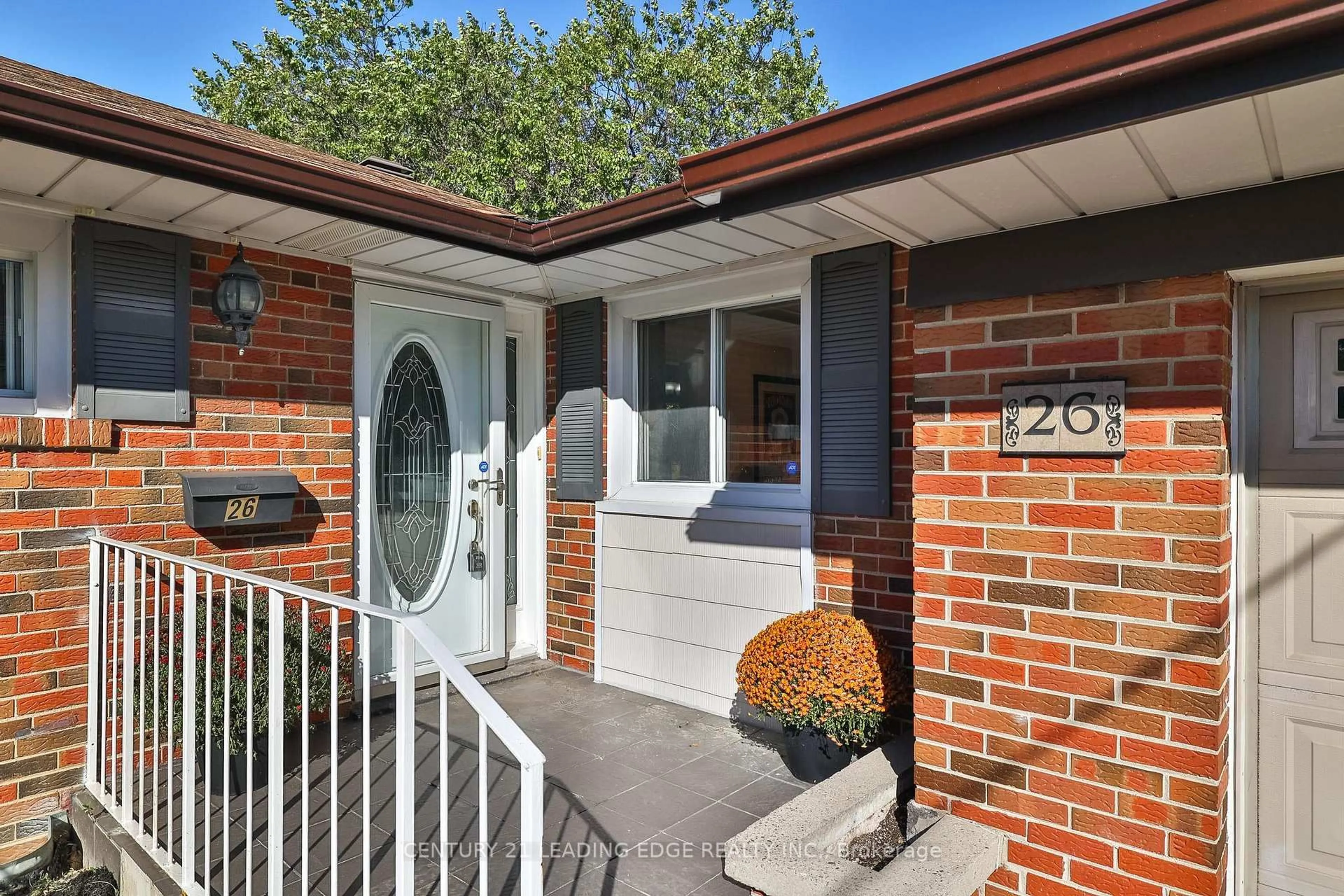 Home with brick exterior material, street for 26 ELVASTON Dr, Toronto Ontario M4A 1M9