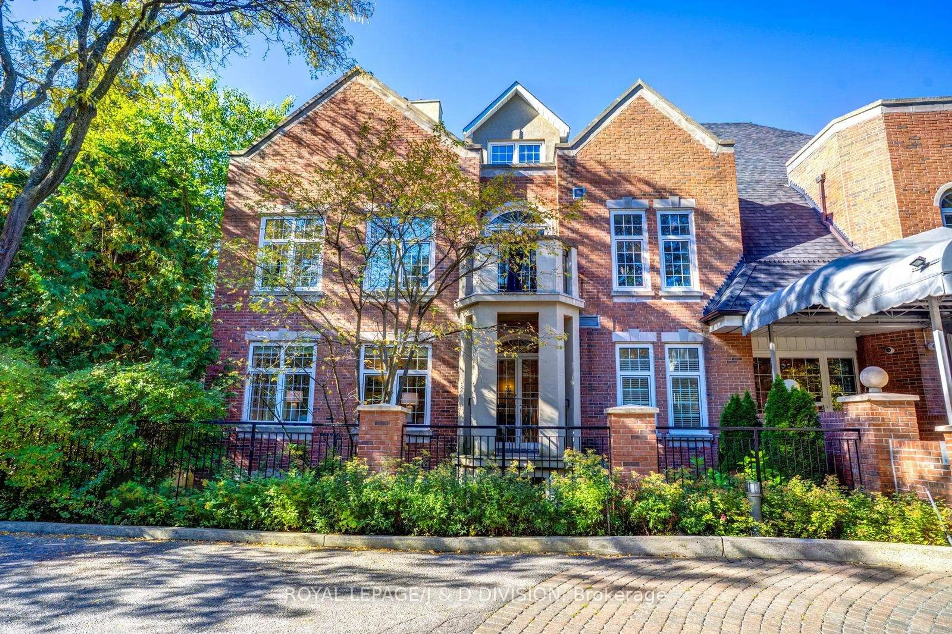 Home with brick exterior material, street for 2 Doncliffe Pl #202B, Toronto Ontario M4N 2R1