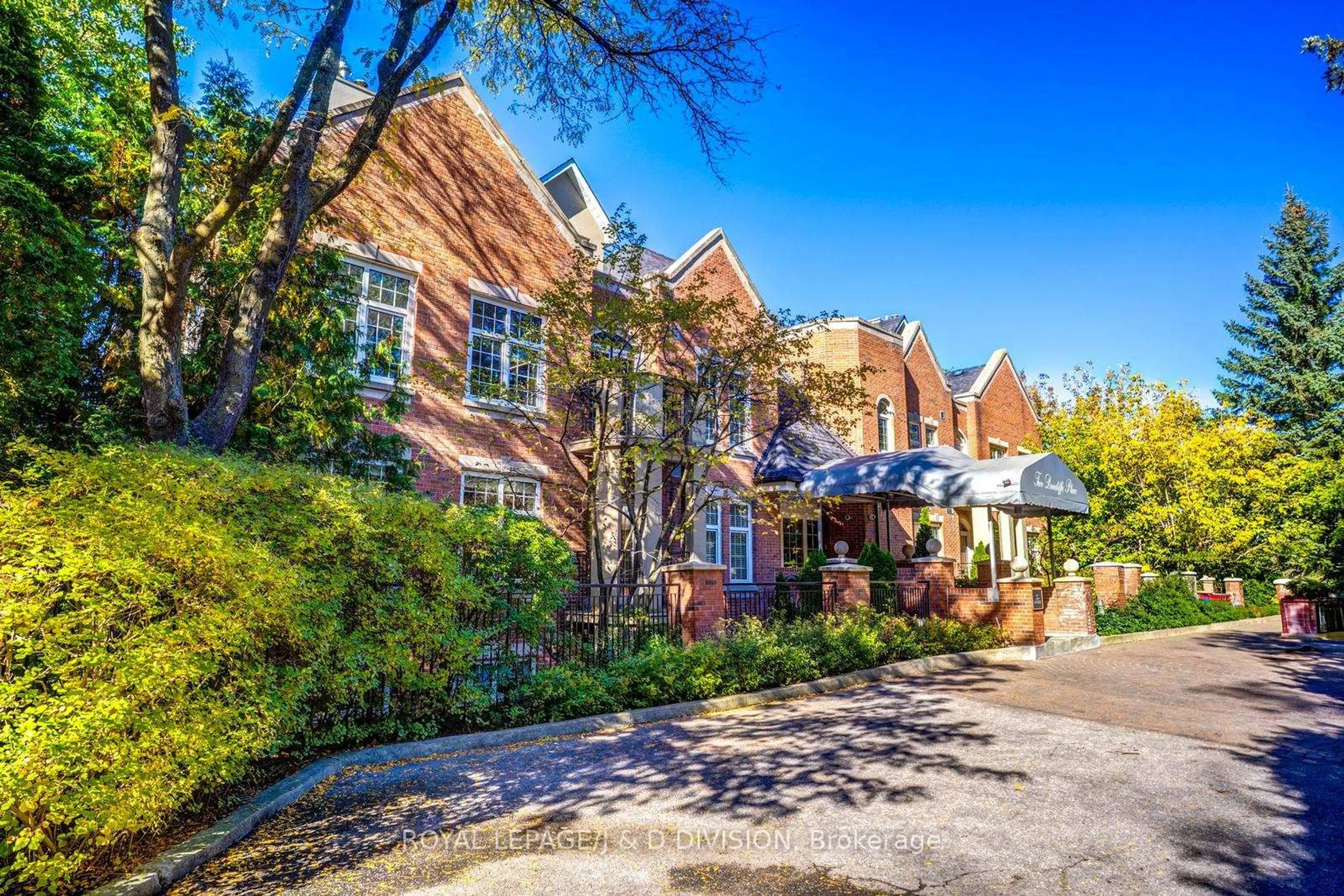 Home with brick exterior material, street for 2 Doncliffe Pl #202B, Toronto Ontario M4N 2R1