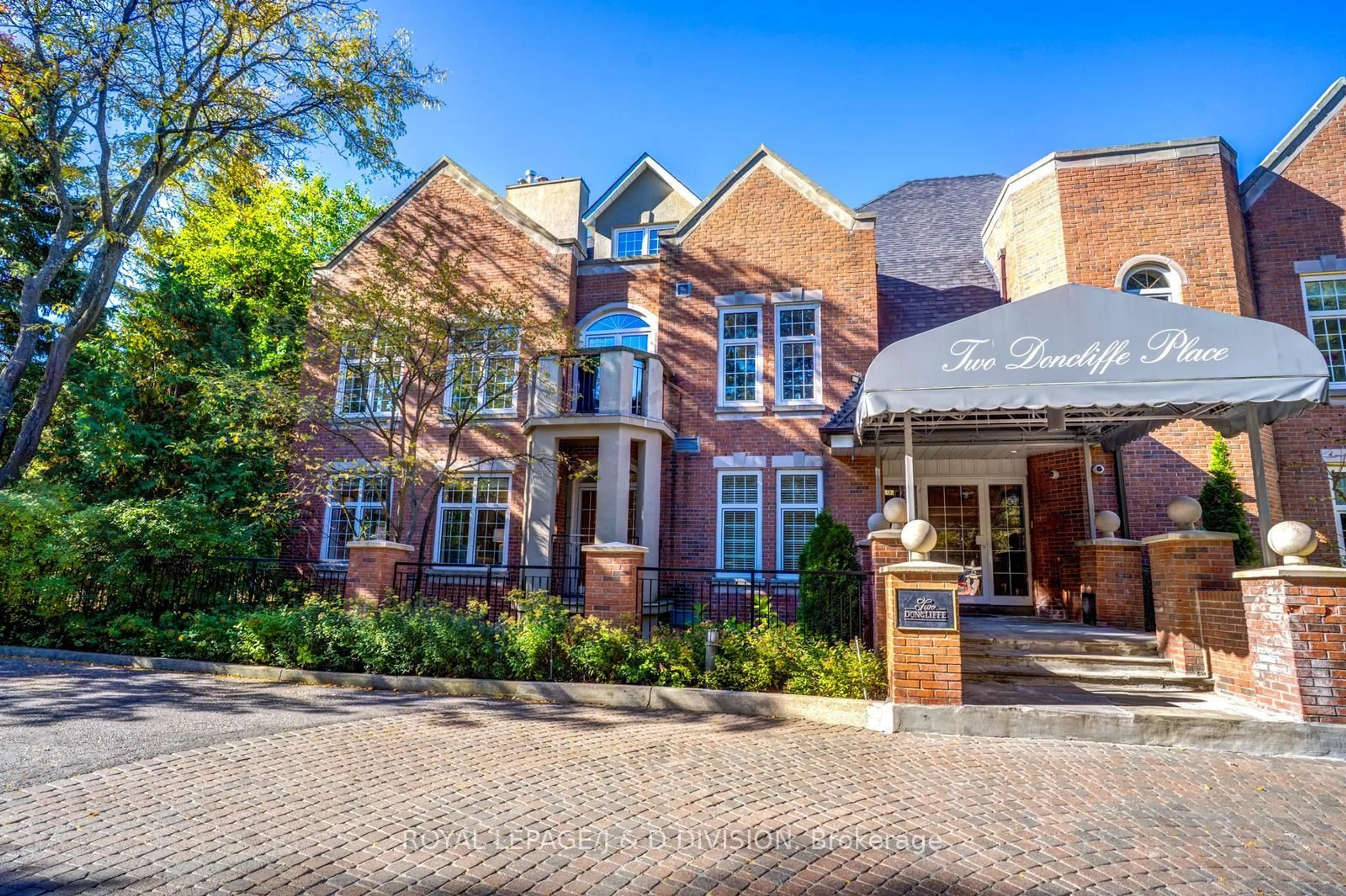 Home with brick exterior material, street for 2 Doncliffe Pl #202B, Toronto Ontario M4N 2R1