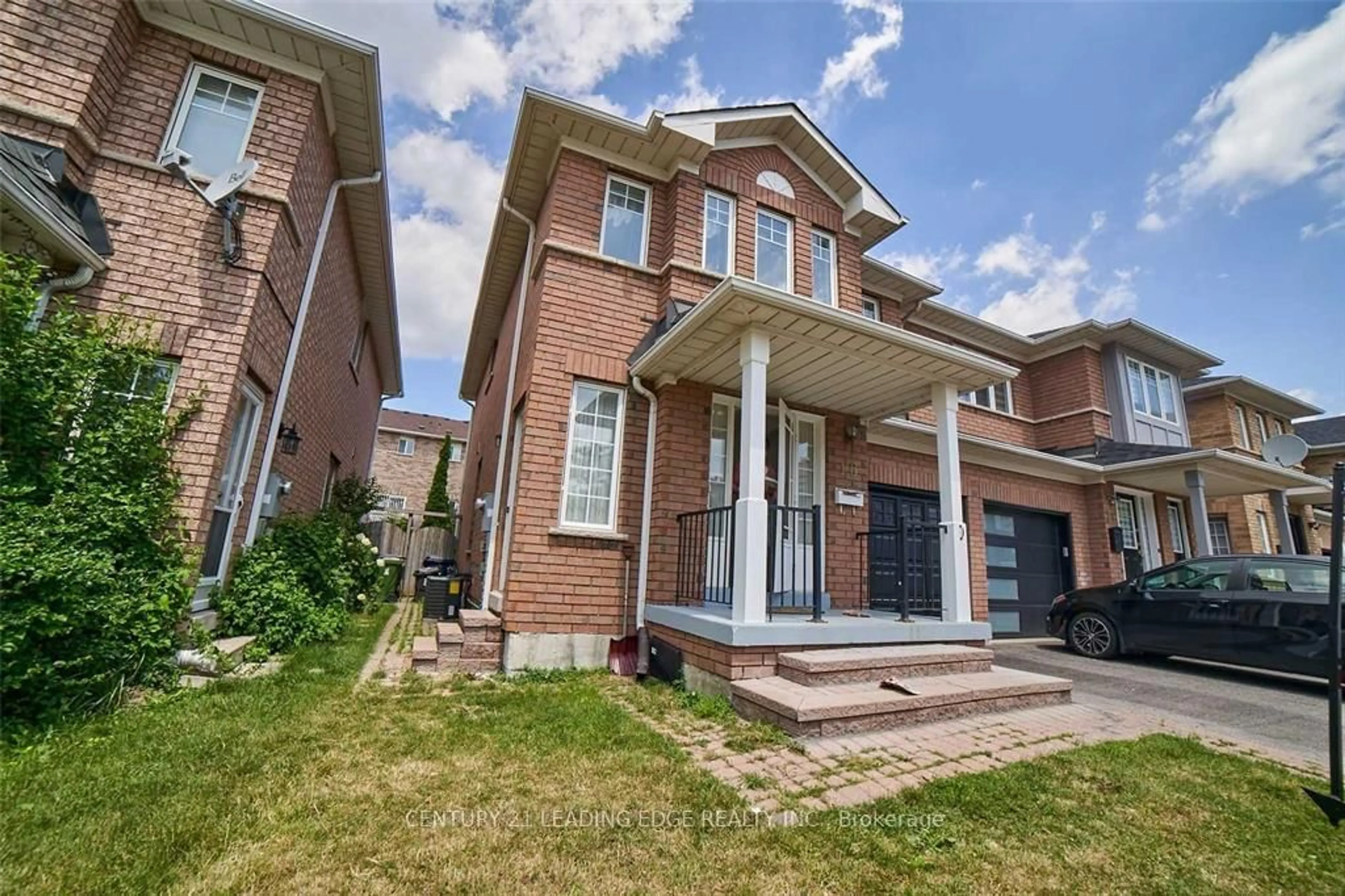 Home with brick exterior material, street for 16 Windom Rd, Toronto Ontario M3C 3X4