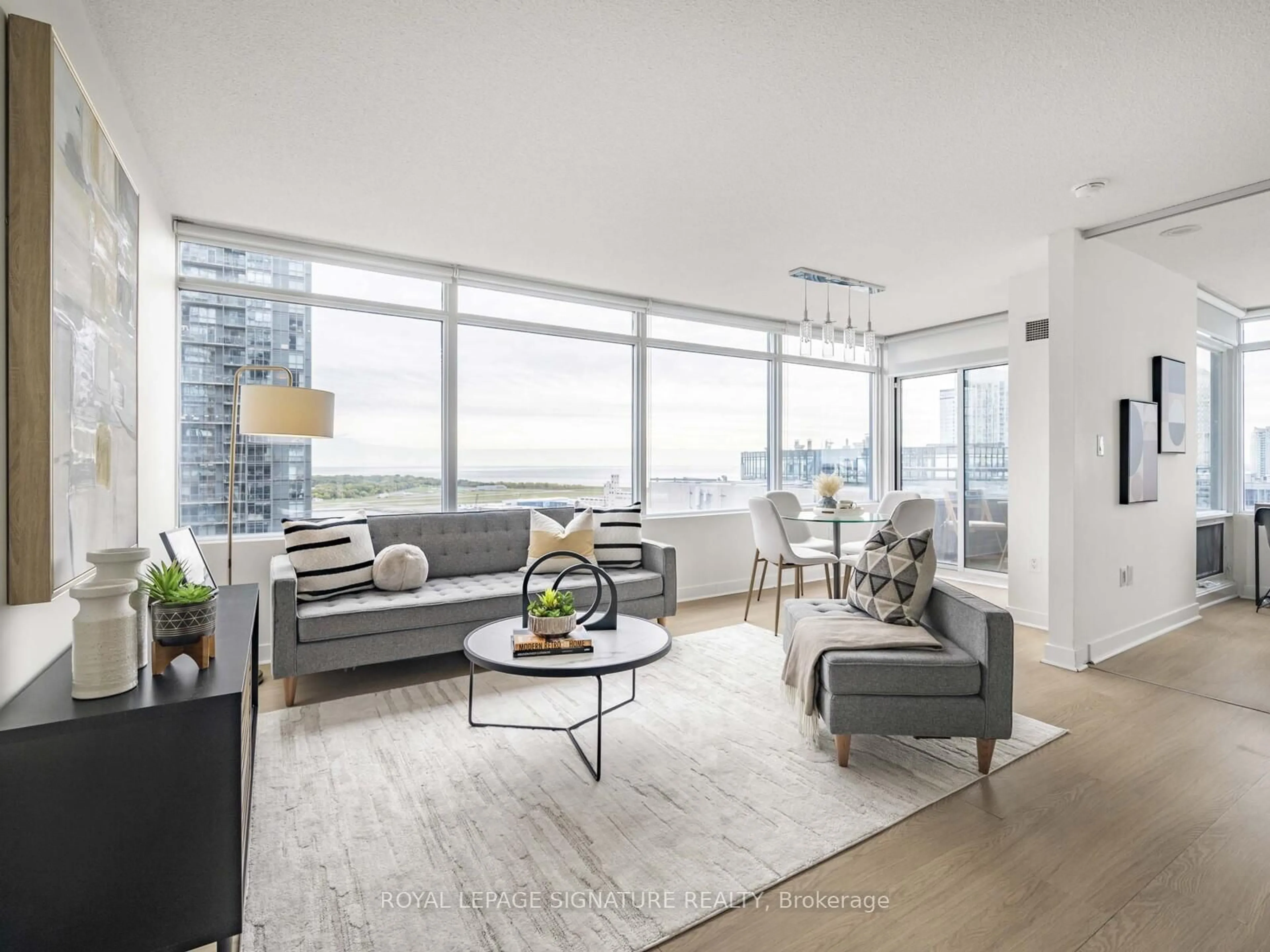 Living room with furniture, unknown for 25 Telegram Mews #2709, Toronto Ontario M5V 3Z1
