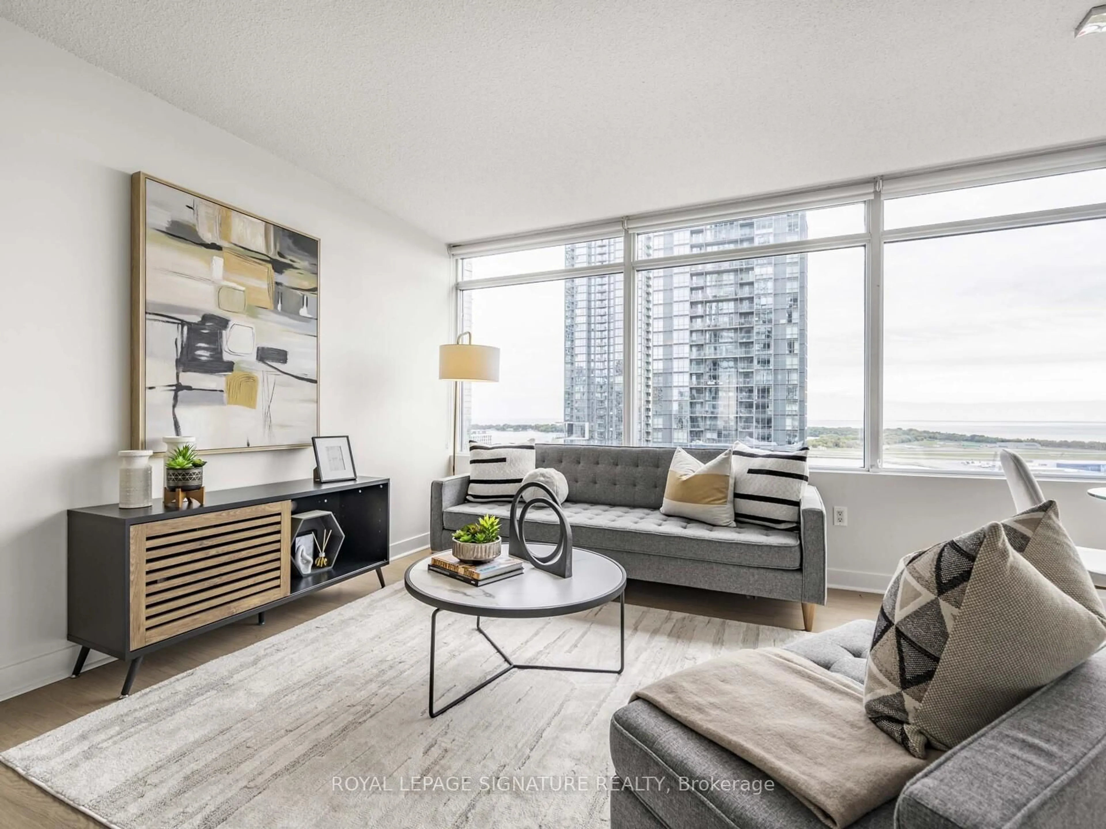 Living room with furniture, unknown for 25 Telegram Mews #2709, Toronto Ontario M5V 3Z1