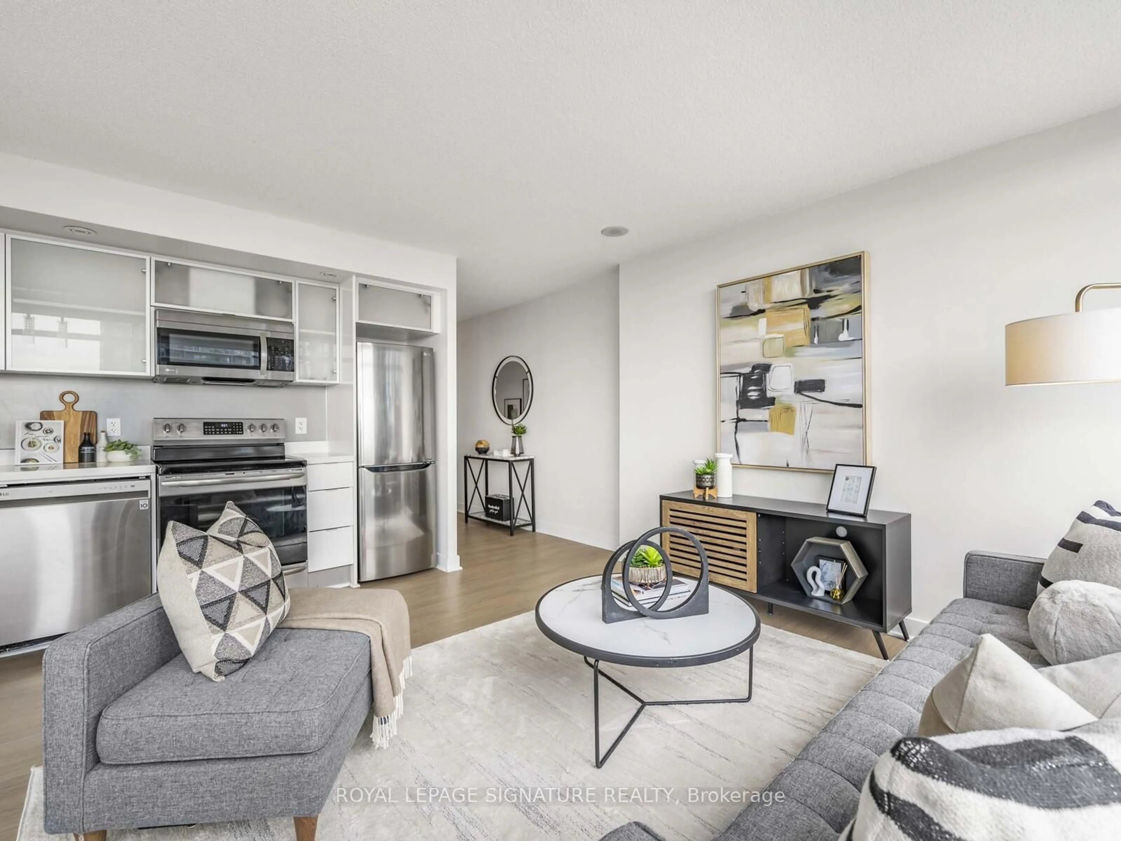 Living room with furniture, unknown for 25 Telegram Mews #2709, Toronto Ontario M5V 3Z1