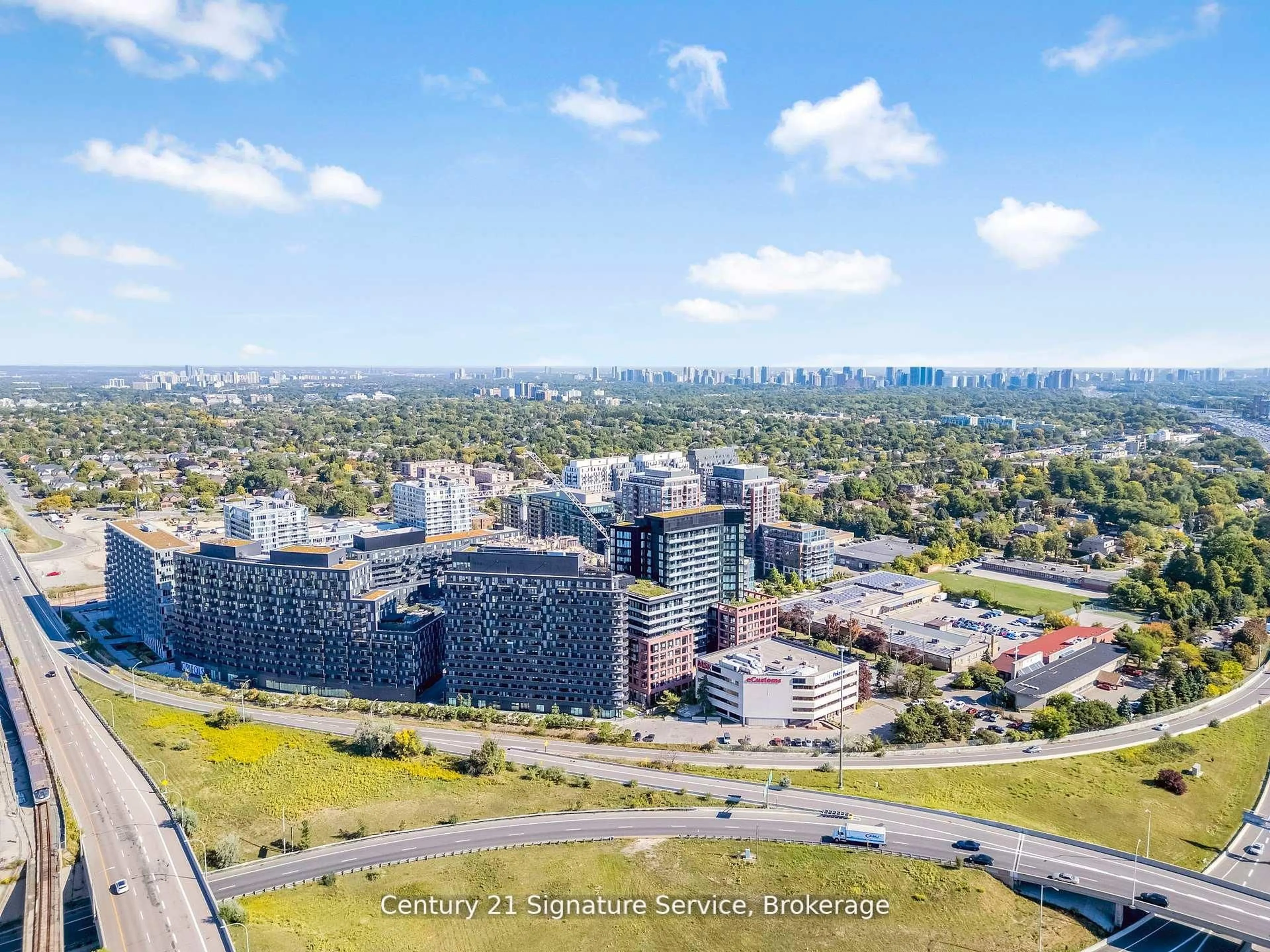 A pic from outside/outdoor area/front of a property/back of a property/a pic from drone, city buildings view from balcony for 8 Tippett Rd #803, Toronto Ontario M3H 0E7