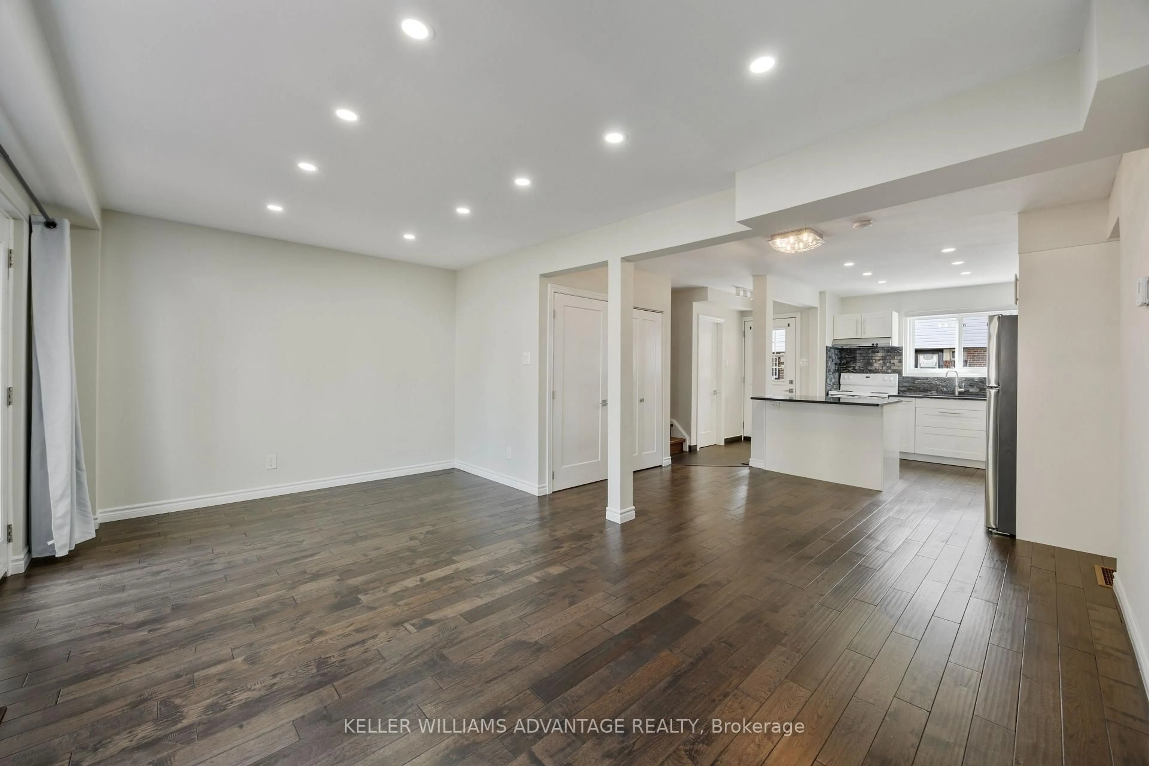 Open concept kitchen, wood/laminate floor for 69 Godstone Rd #118, Toronto Ontario M2J 3C8