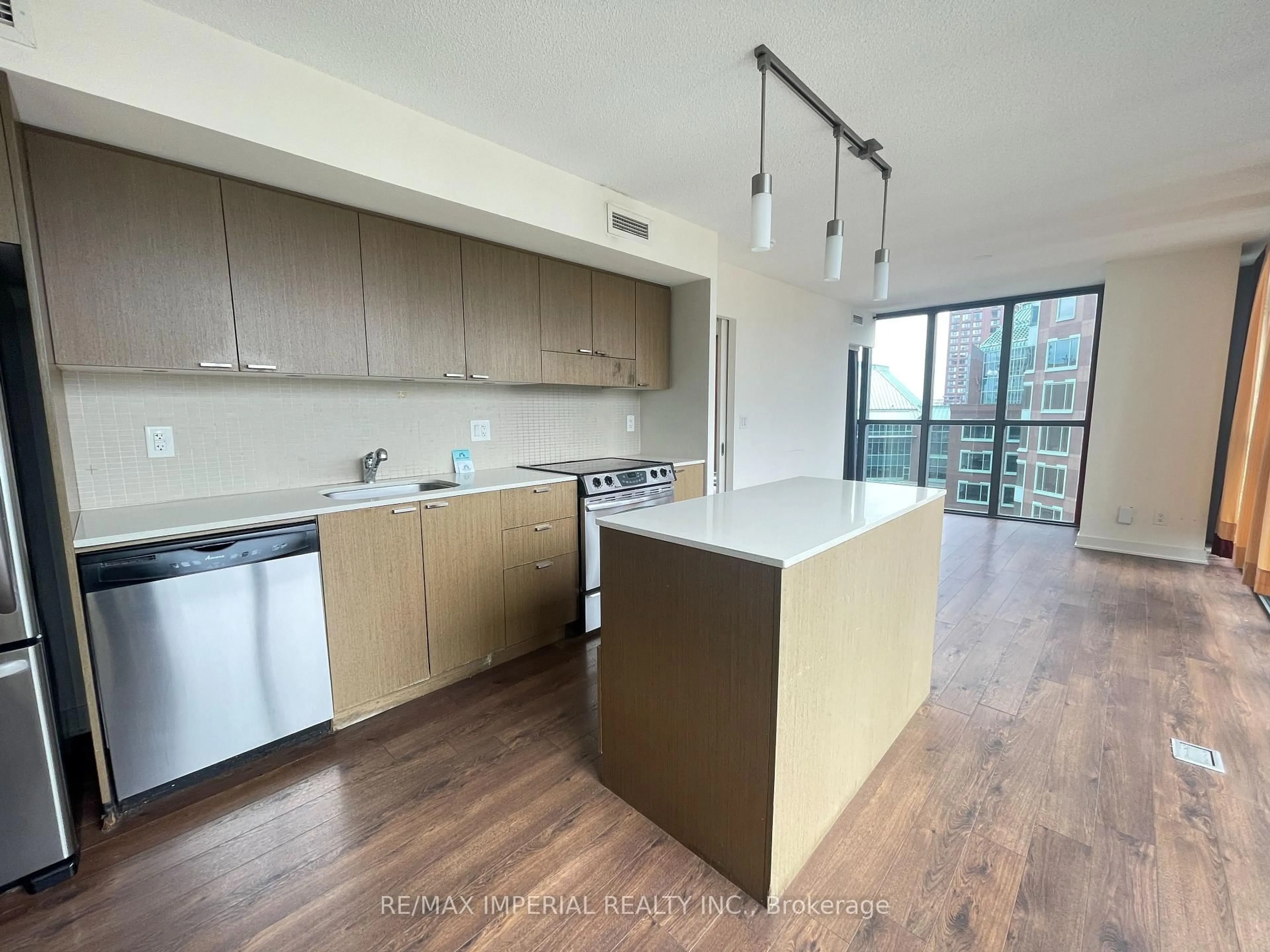 Open concept kitchen, wood/laminate floor for 110 Charles St #1602, Toronto Ontario M4Y 1T5