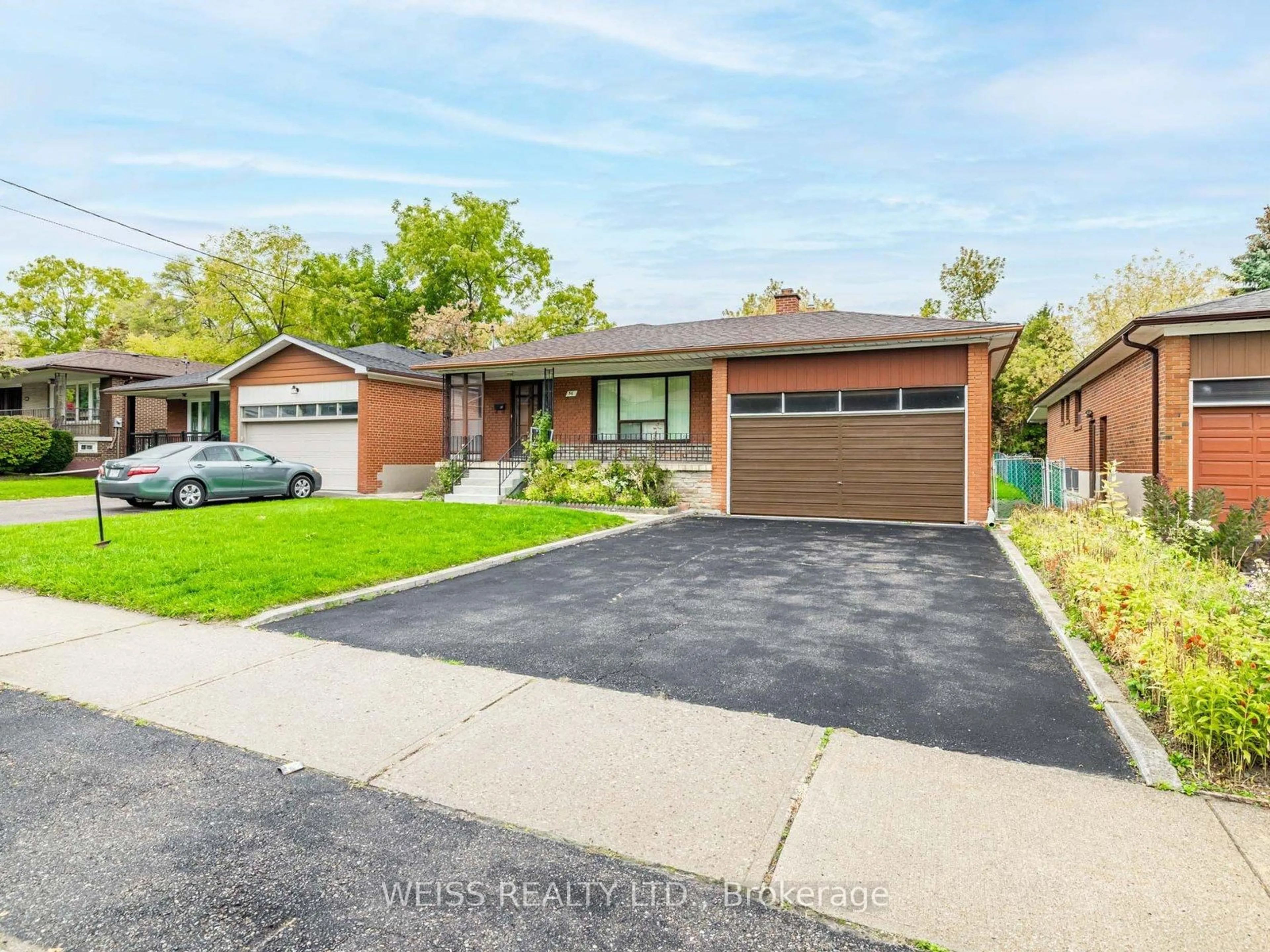 Home with brick exterior material, street for 56 Ranee Ave, Toronto Ontario M6A 1M9