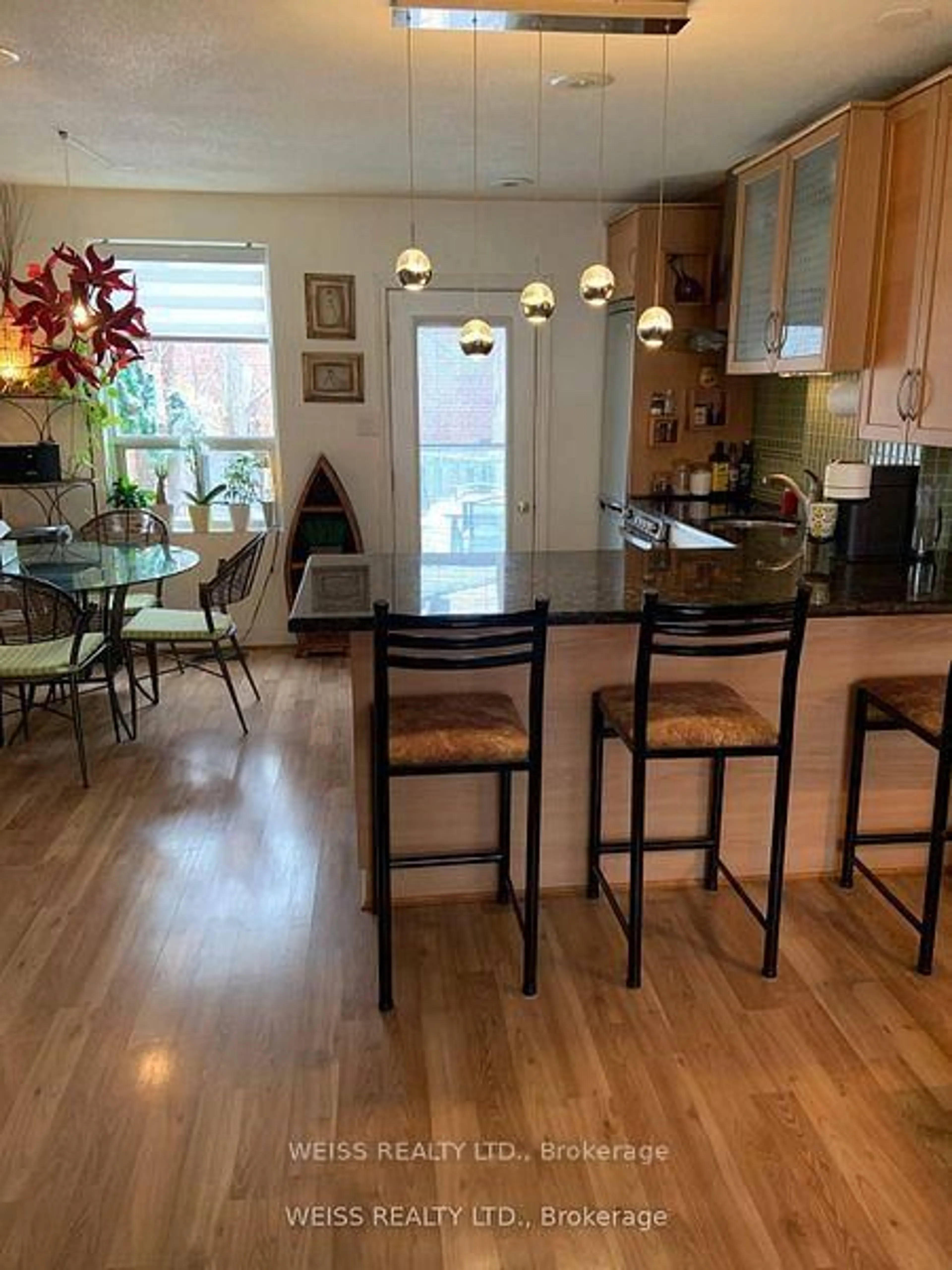 Dining room, wood/laminate floor for 3 Khedive Ave, Toronto Ontario M6A 2G1