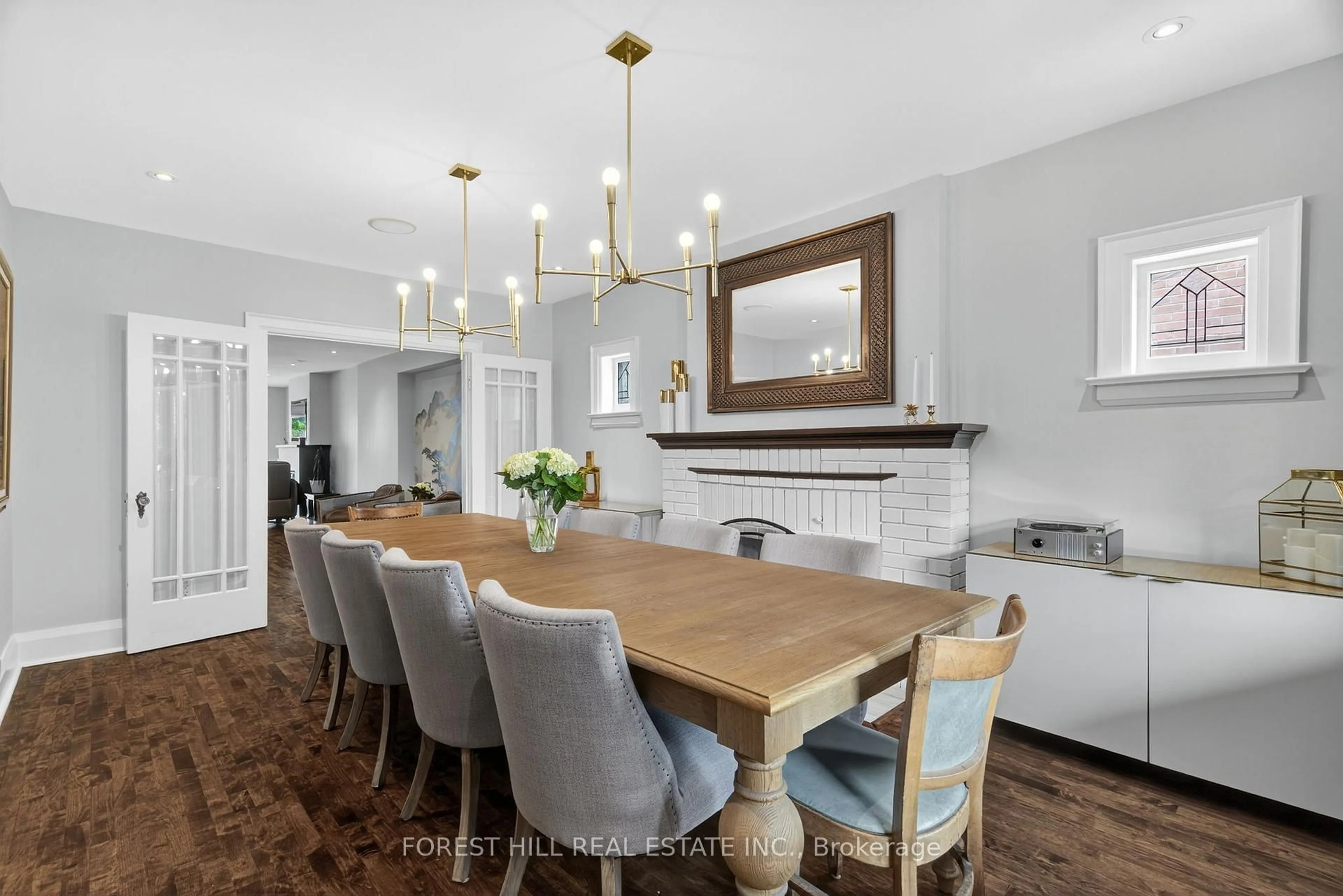 Dining room, wood/laminate floor for 82 Pinewood Ave, Toronto Ontario M6C 2V1