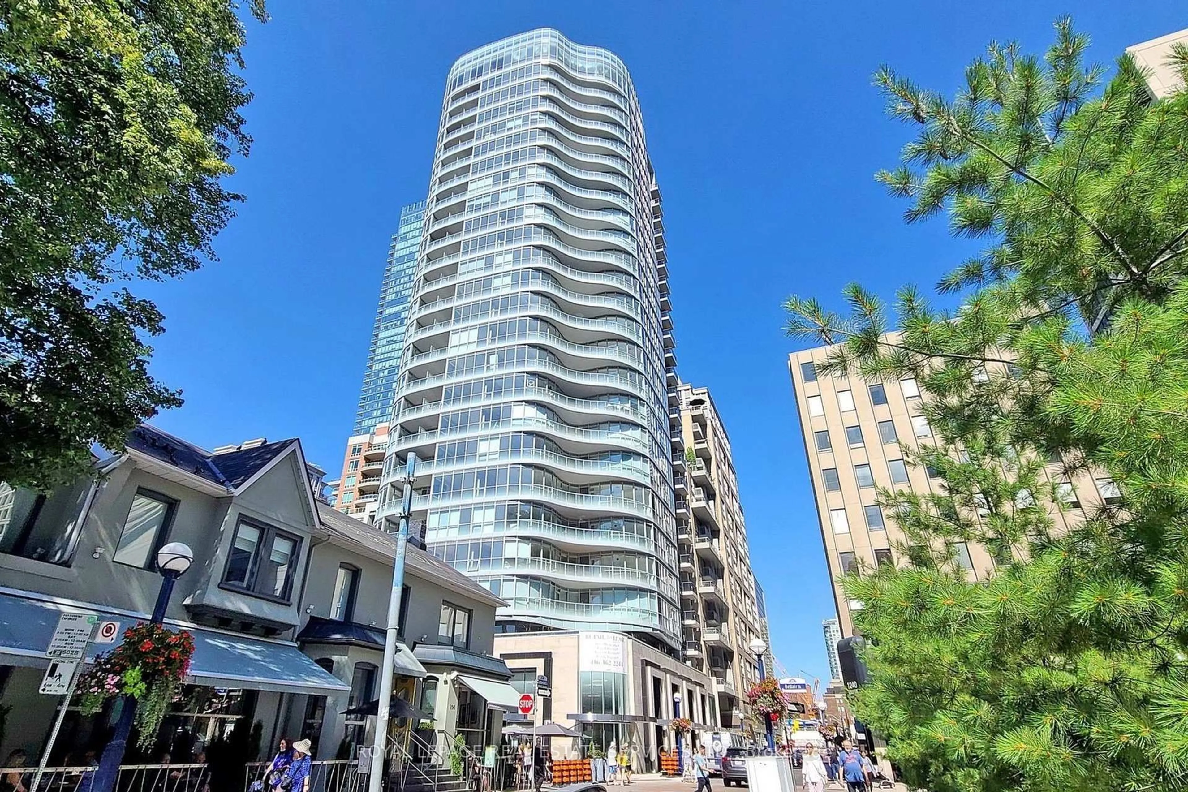 Patio, city buildings view from balcony for 88 Cumberland St #808, Toronto Ontario M5R 1A3