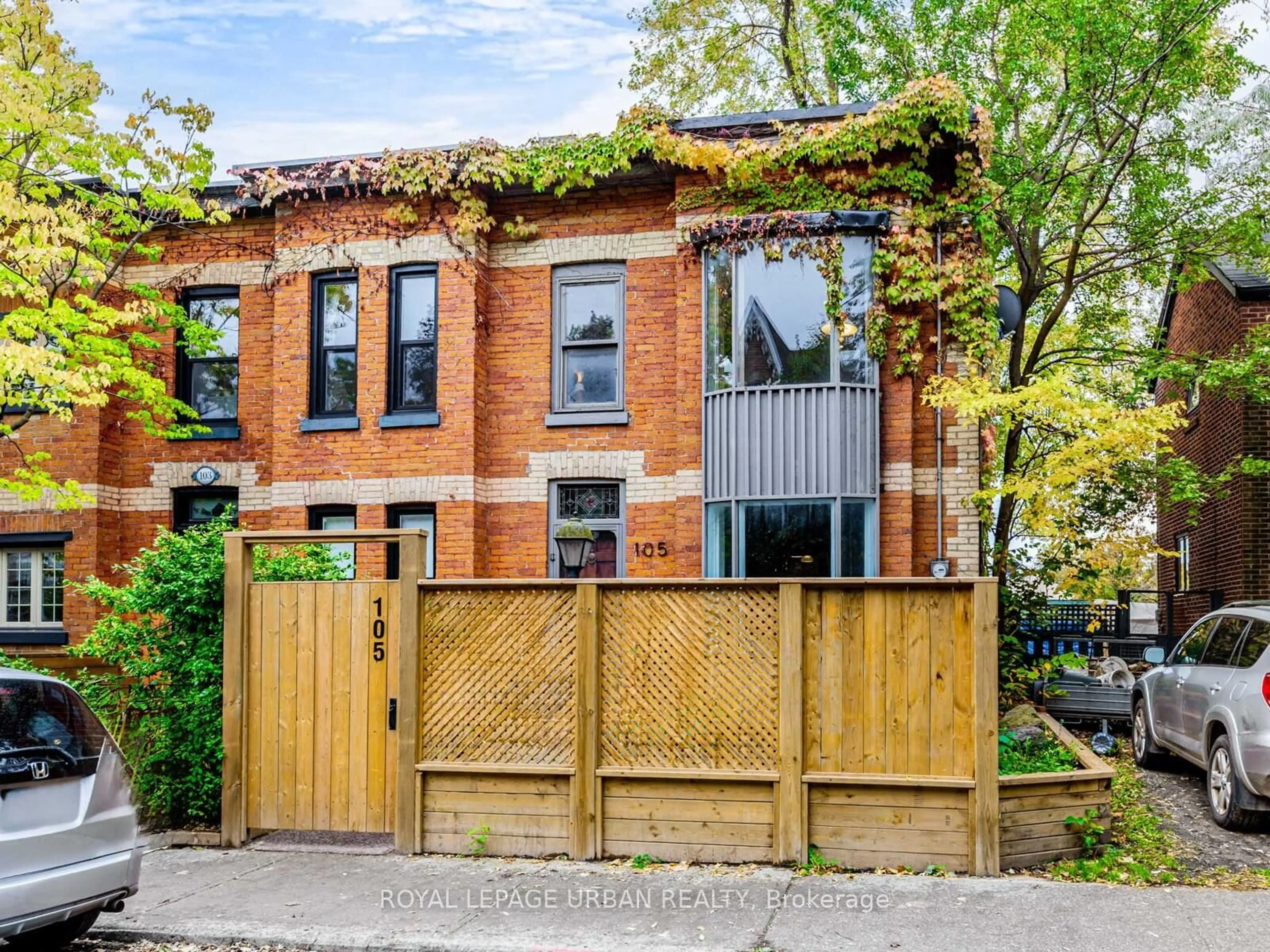 Home with brick exterior material, street for 105 Sussex Ave, Toronto Ontario M5S 1K4