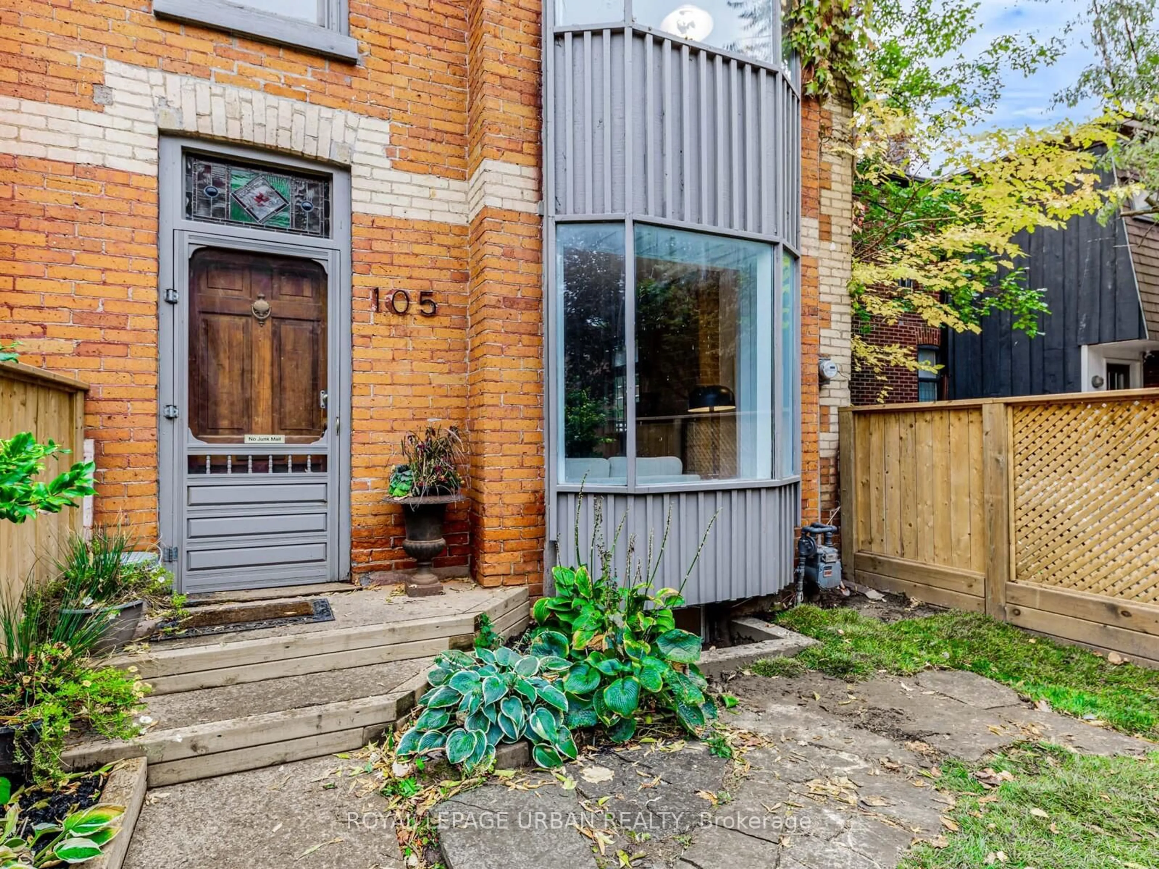Home with brick exterior material, street for 105 Sussex Ave, Toronto Ontario M5S 1K4