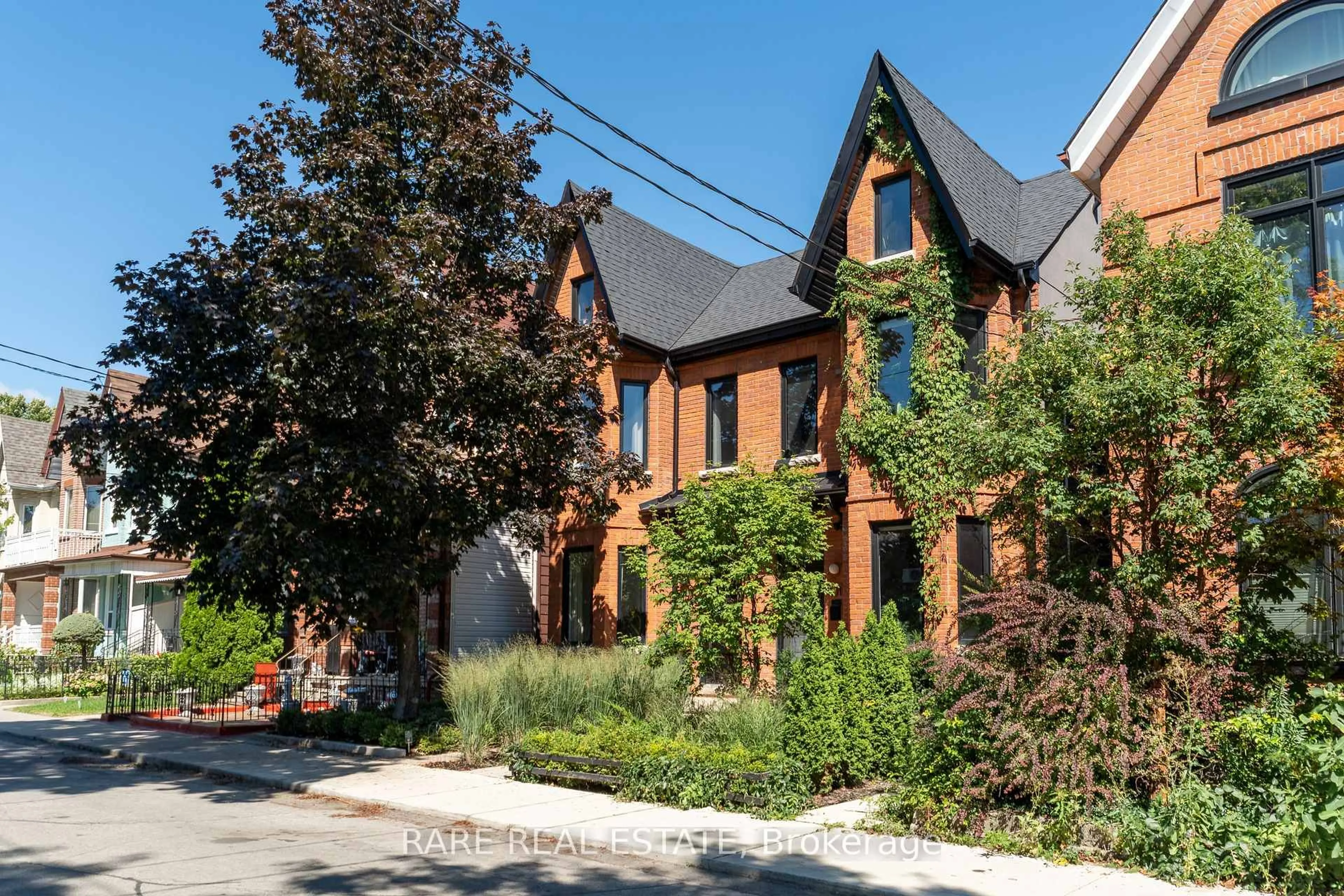 Home with brick exterior material, street for 103 Northcote Ave, Toronto Ontario M6J 3K4