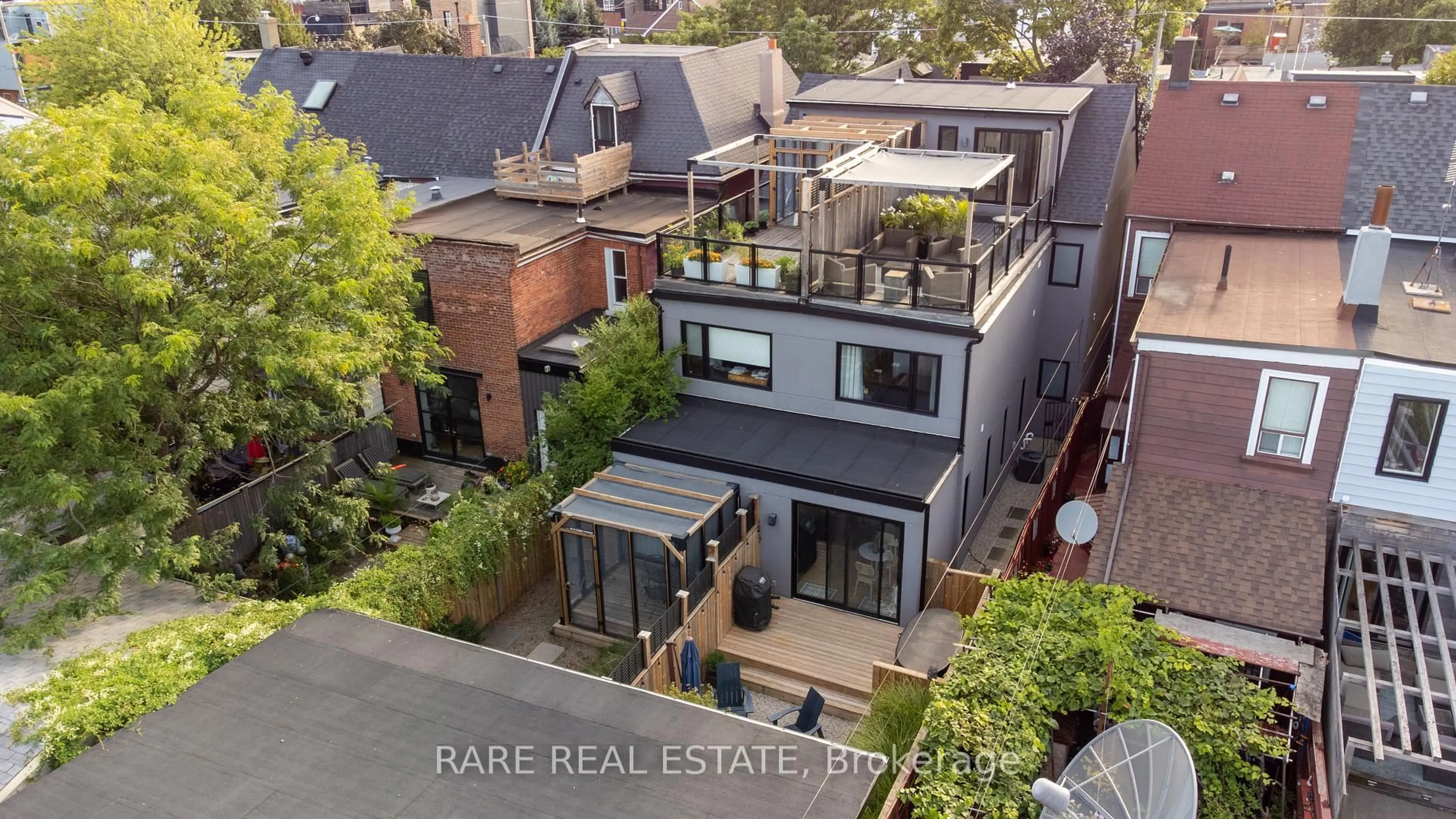 A pic from outside/outdoor area/front of a property/back of a property/a pic from drone, unknown for 103 Northcote Ave, Toronto Ontario M6J 3K4