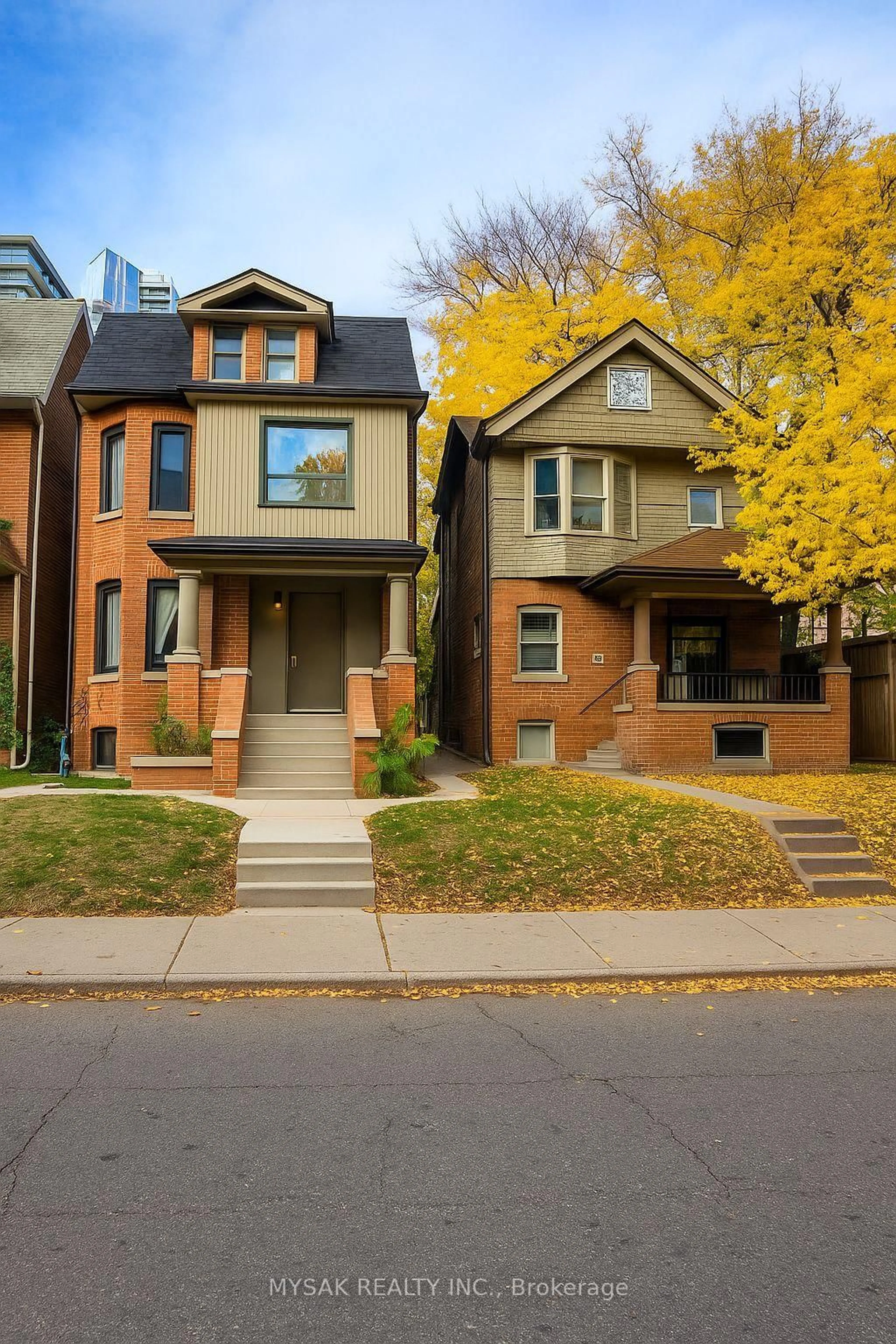 Home with brick exterior material, street for 50-52 Dundonald St, Toronto Ontario M4Y 1K2