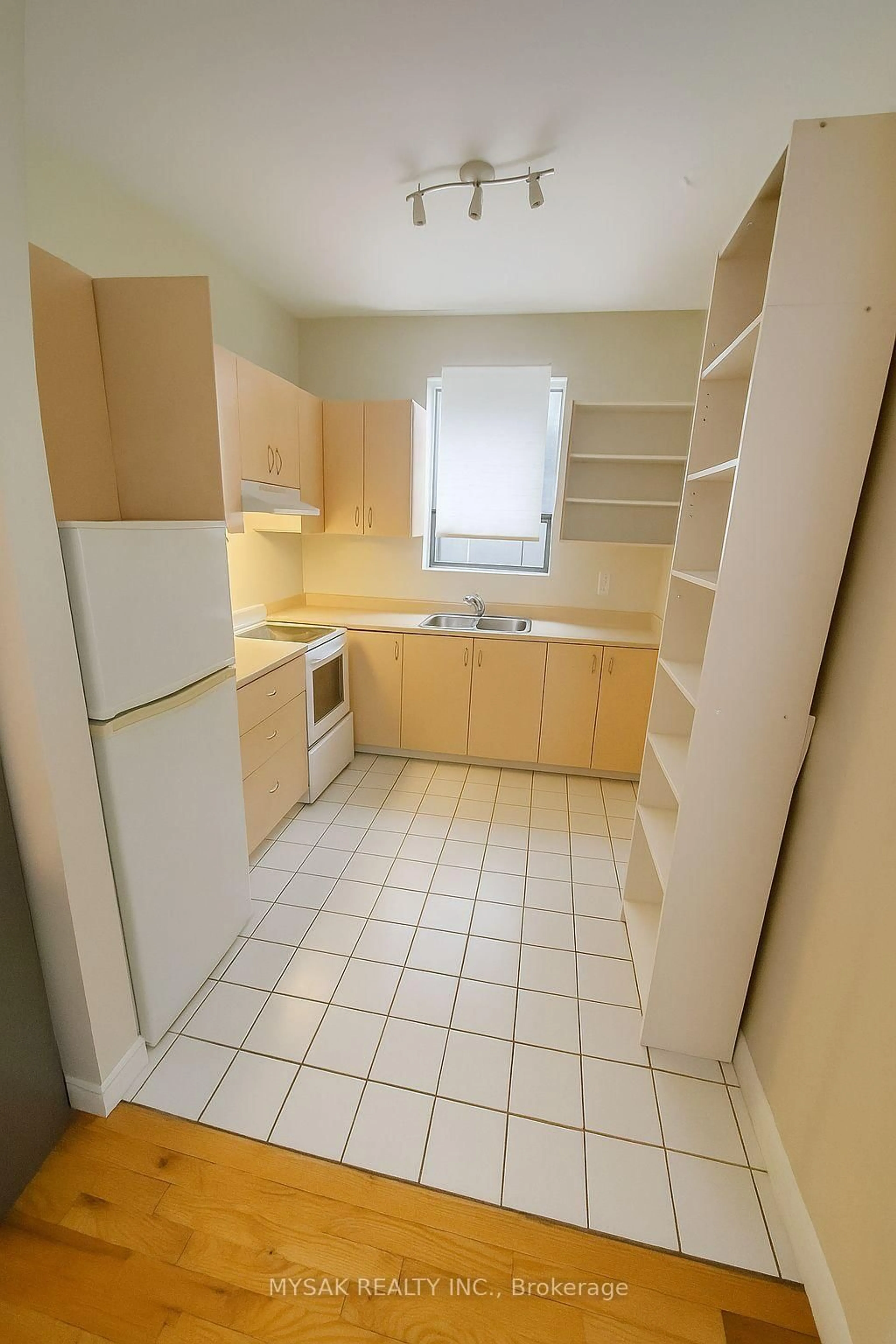 Standard kitchen, floor is not visible for 50-52 Dundonald St, Toronto Ontario M4Y 1K2
