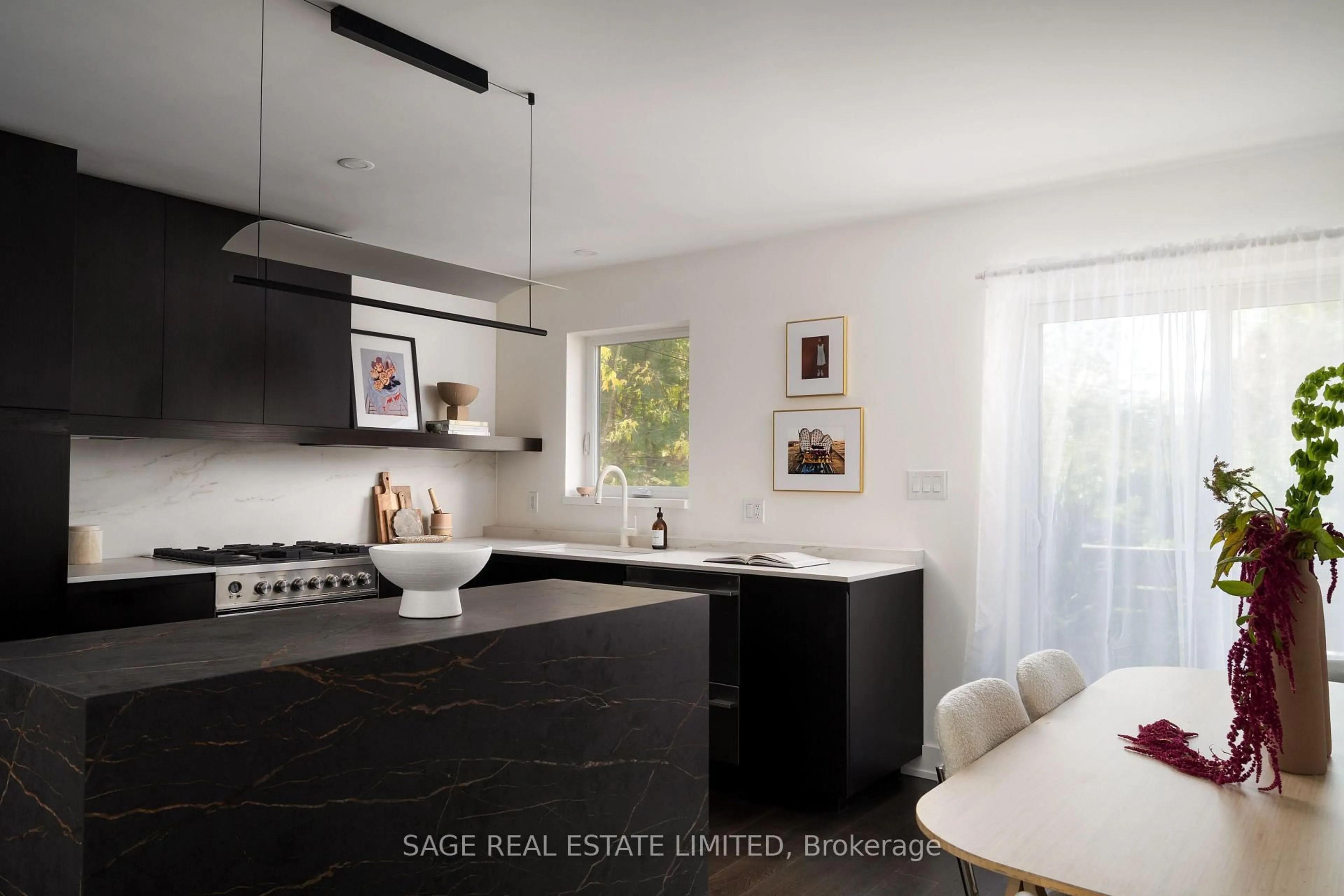 Contemporary kitchen, wood/laminate floor for 276 Oakwood Ave, Toronto Ontario M6E 2V6