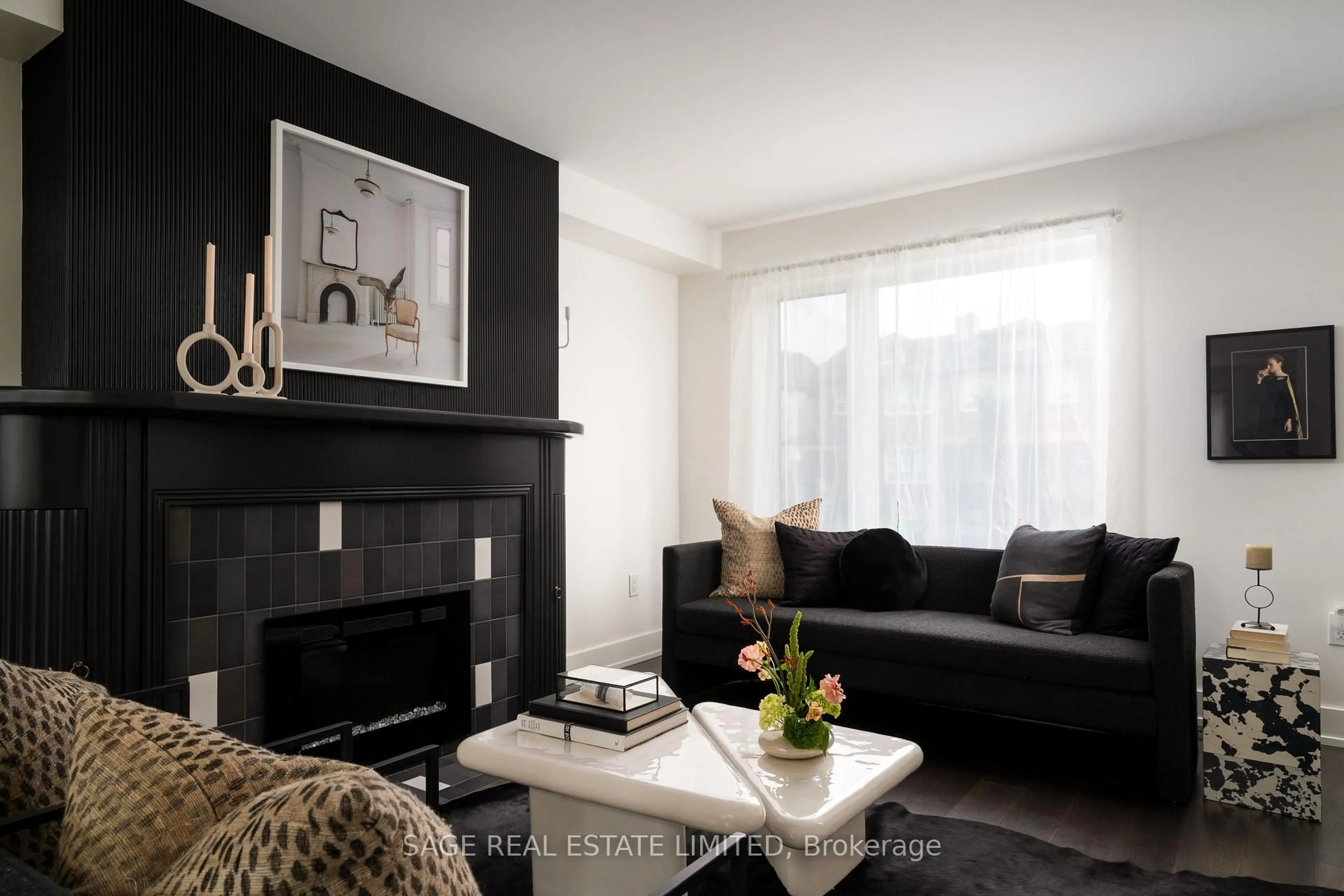 Living room with furniture, wood/laminate floor for 276 Oakwood Ave, Toronto Ontario M6E 2V6