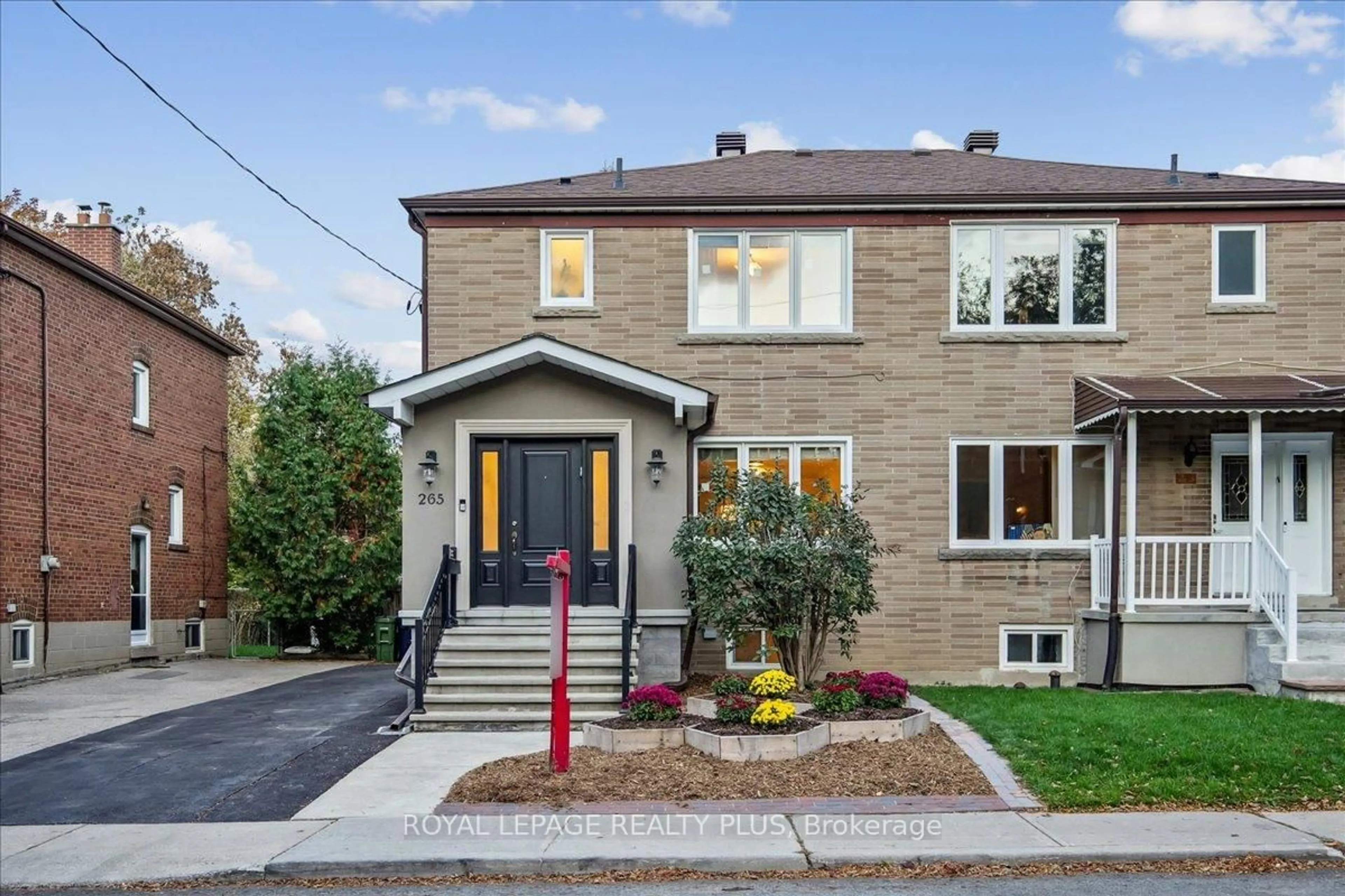 Home with brick exterior material, street for 265 Winnett Ave, Toronto Ontario M6C 3L8