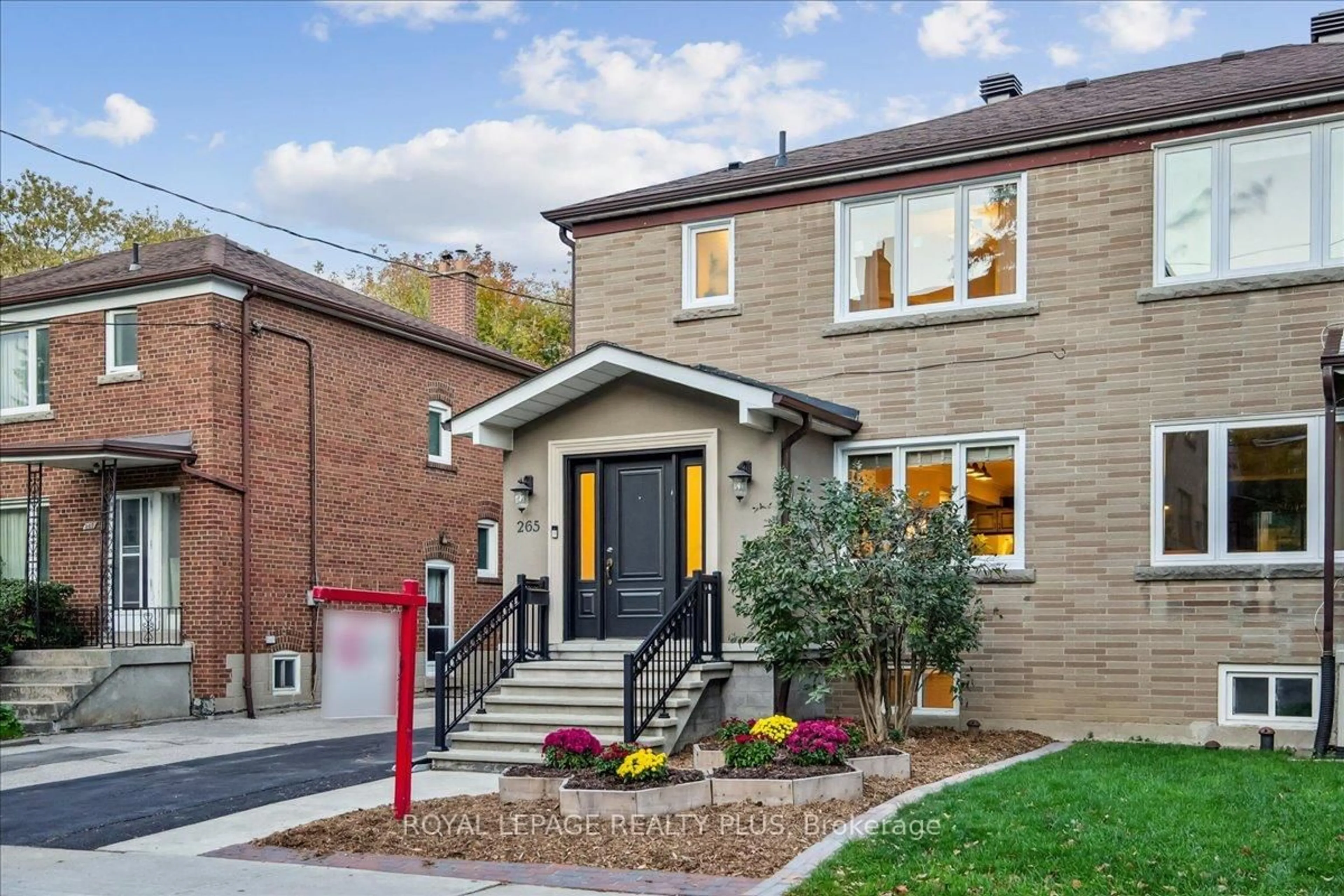 Home with brick exterior material, street for 265 Winnett Ave, Toronto Ontario M6C 3L8