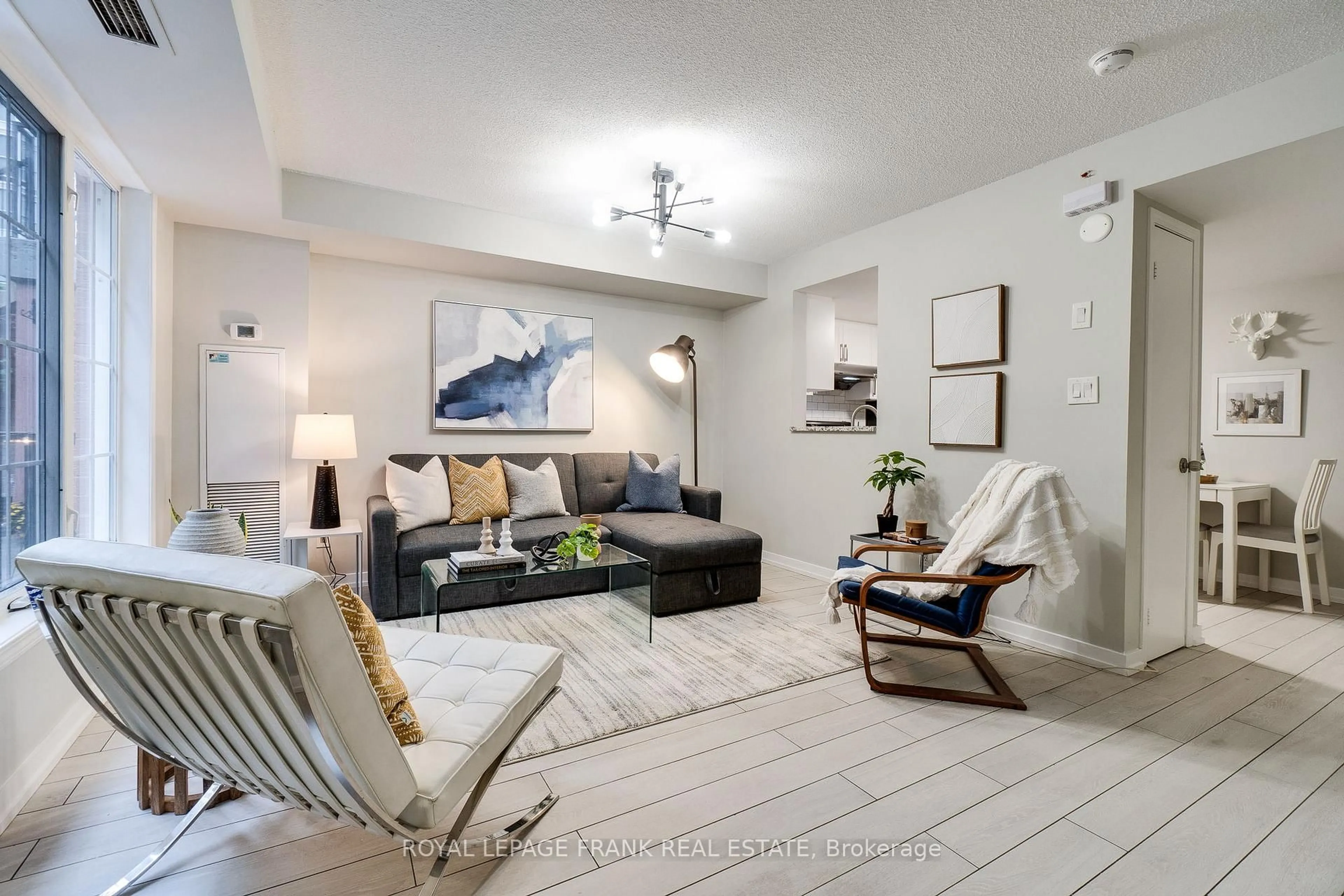 Living room with furniture, unknown for 70 Douro St #121, Toronto Ontario M6K 3N4
