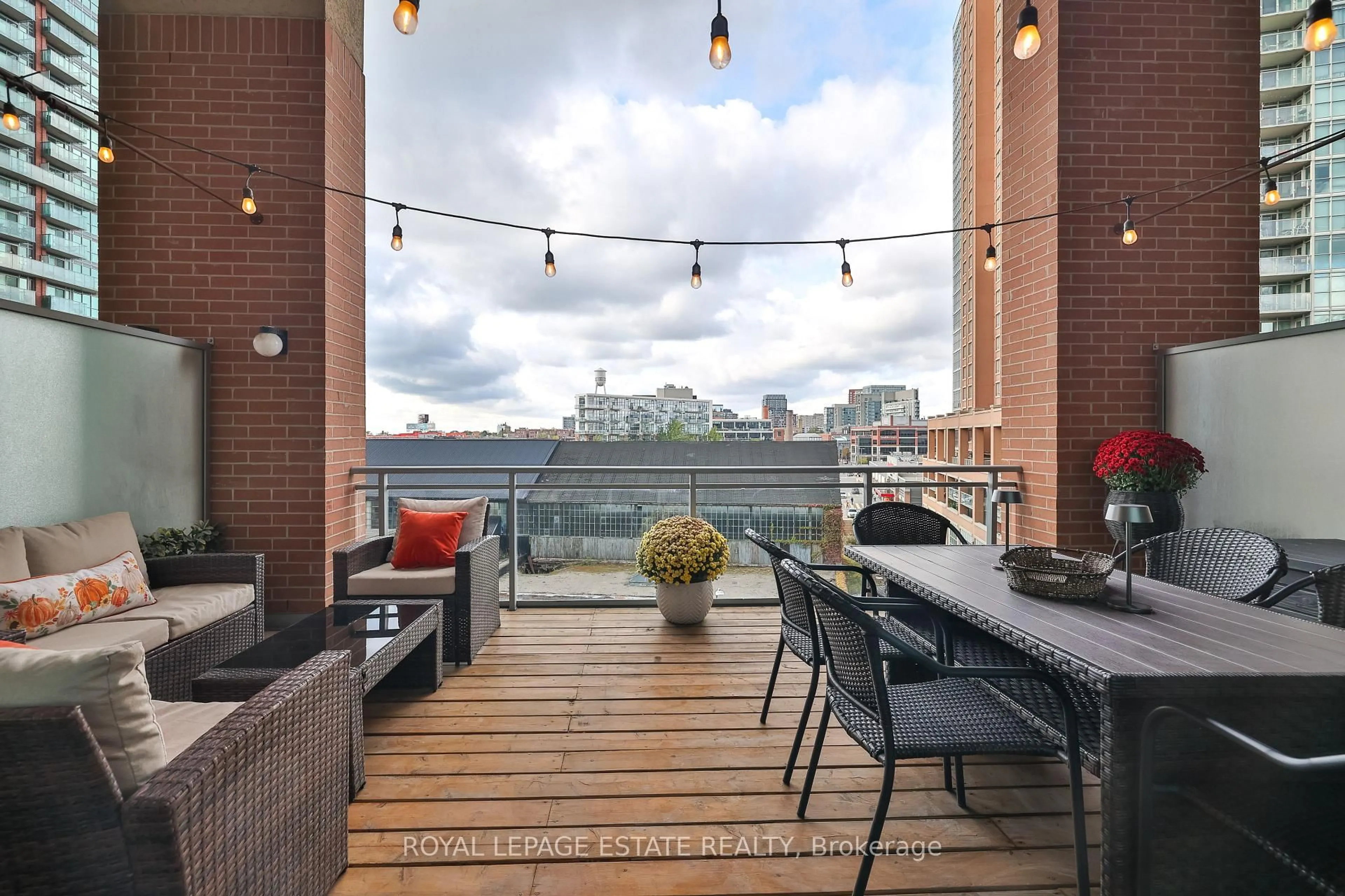 Patio, city buildings view from balcony for 100 Western Battery Rd #414, Toronto Ontario M6K 3S2