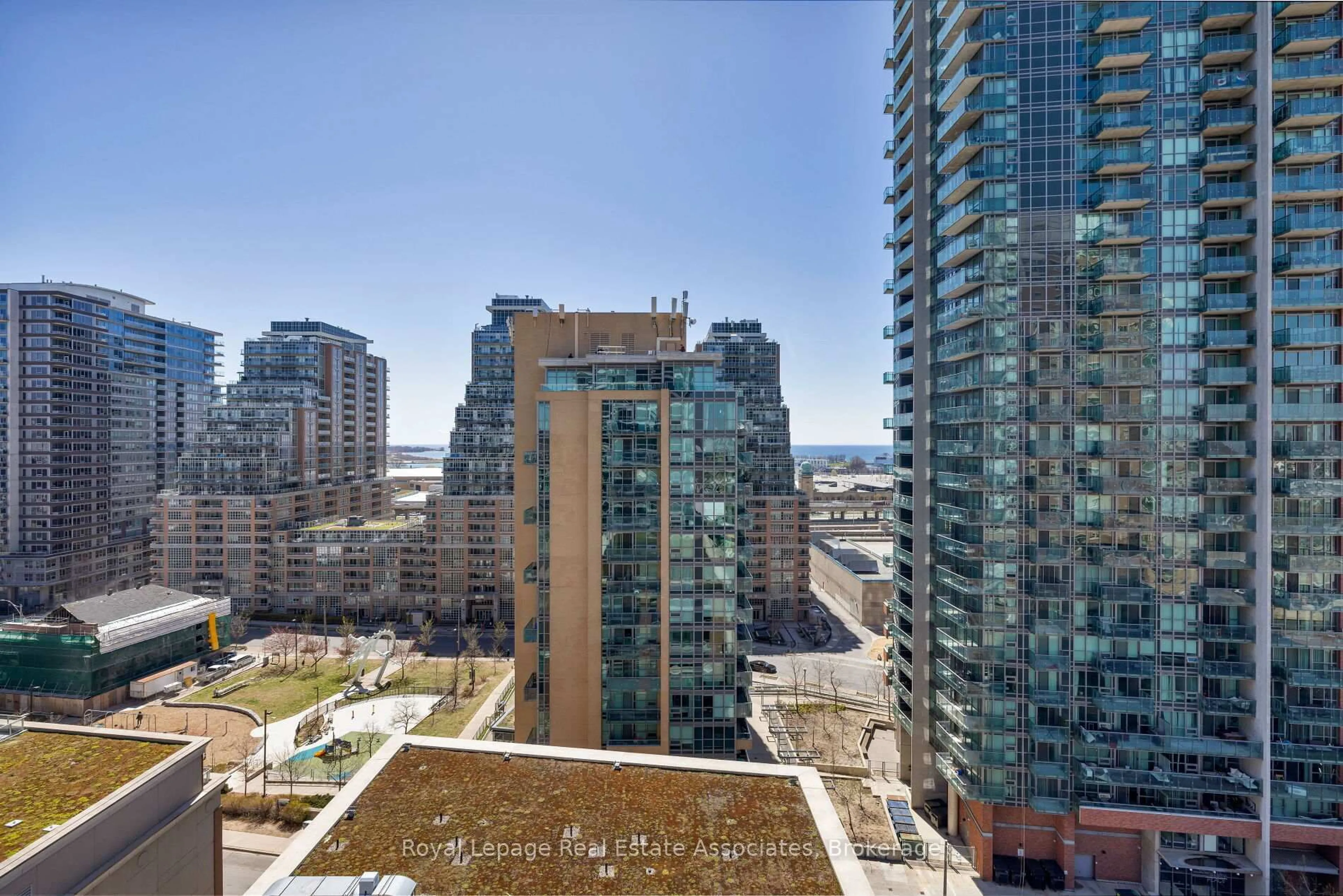 A pic from outside/outdoor area/front of a property/back of a property/a pic from drone, city buildings view from balcony for 100 Western Battery Rd #1203, Toronto Ontario M6K 3S2