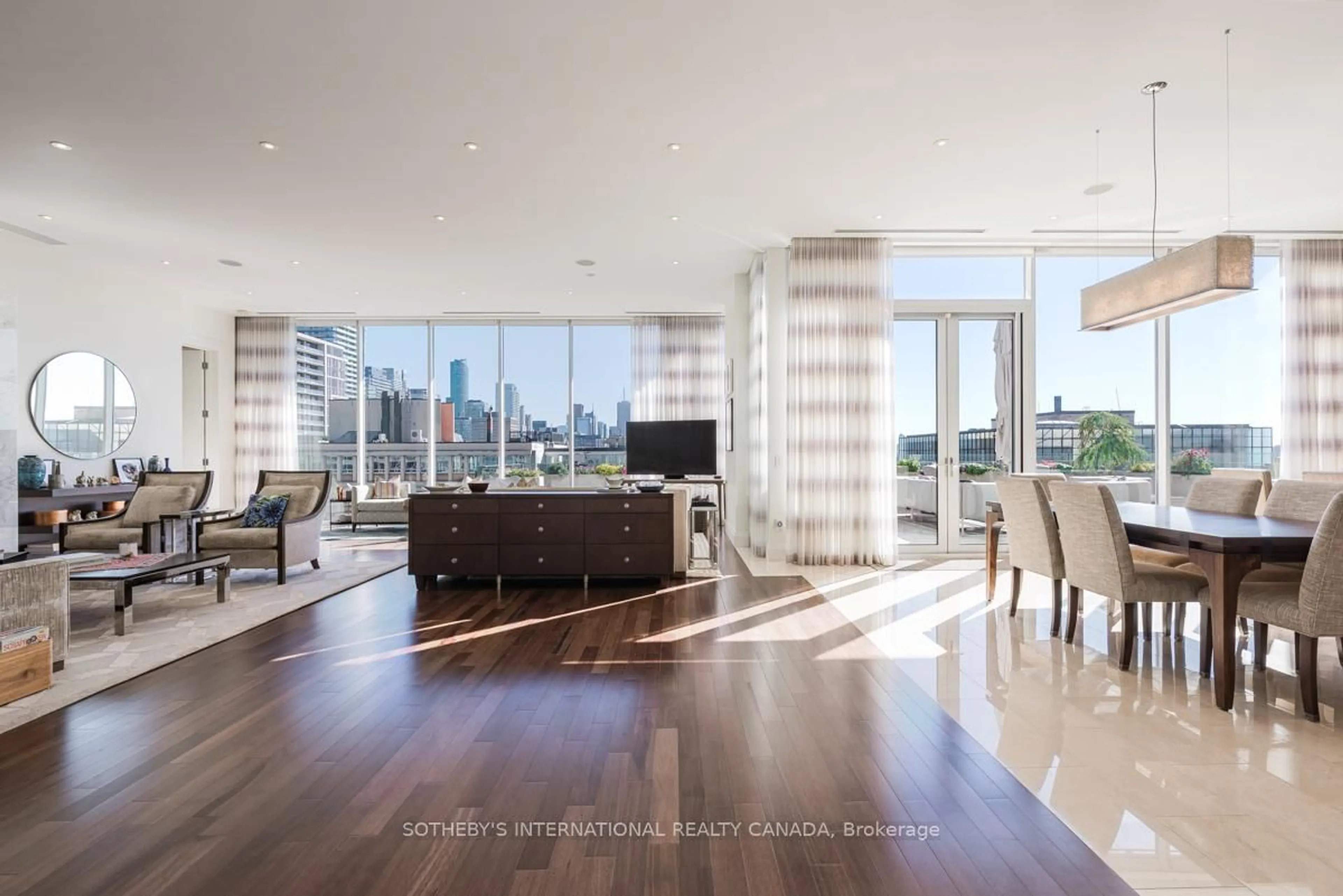 Living room with furniture, wood/laminate floor for 155 Cumberland St #1201, Toronto Ontario M5R 1A2