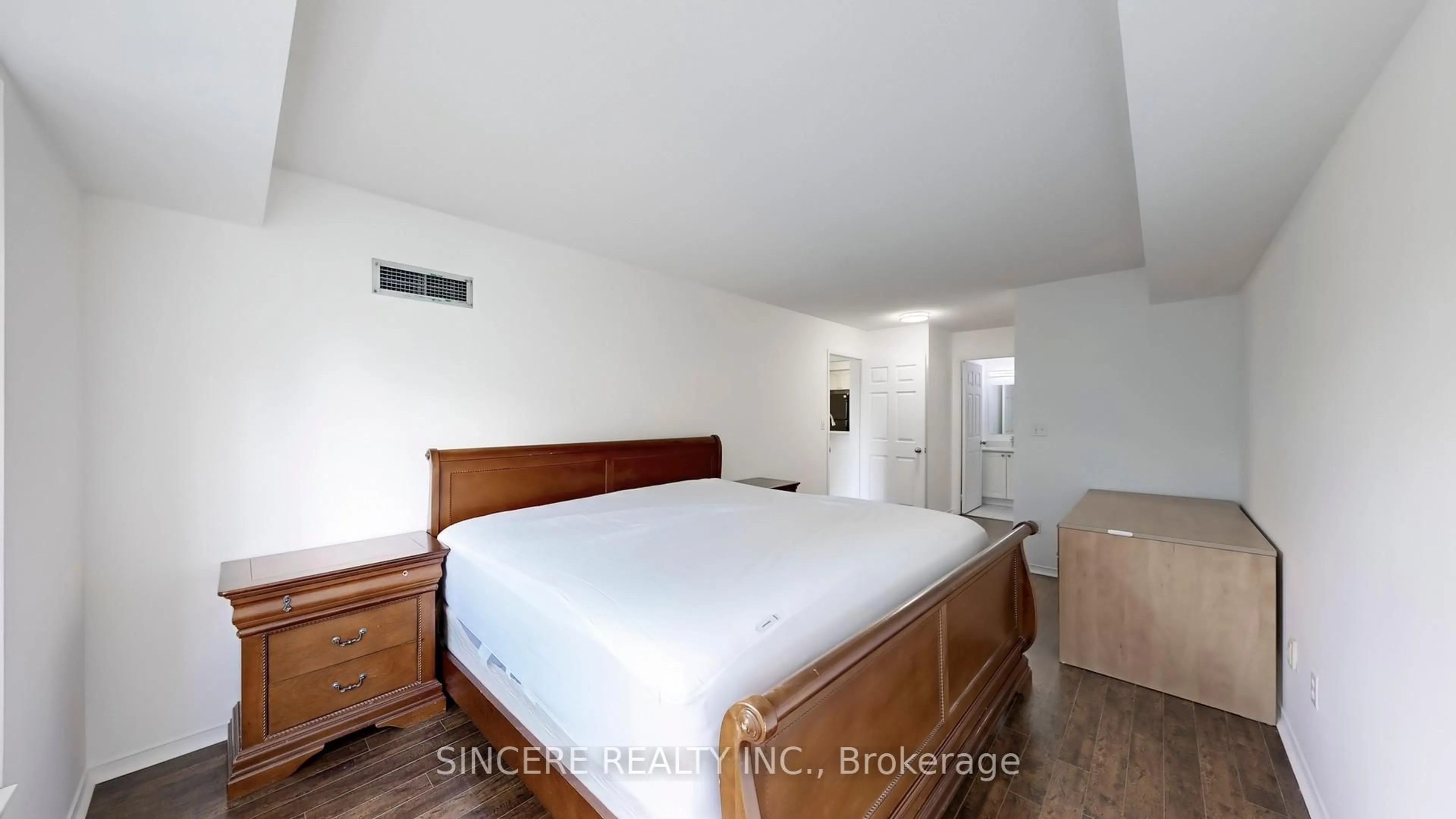 Bedroom with bed, wood/laminate floor for 39 Pemberton Ave #310, Toronto Ontario M2M 4L6