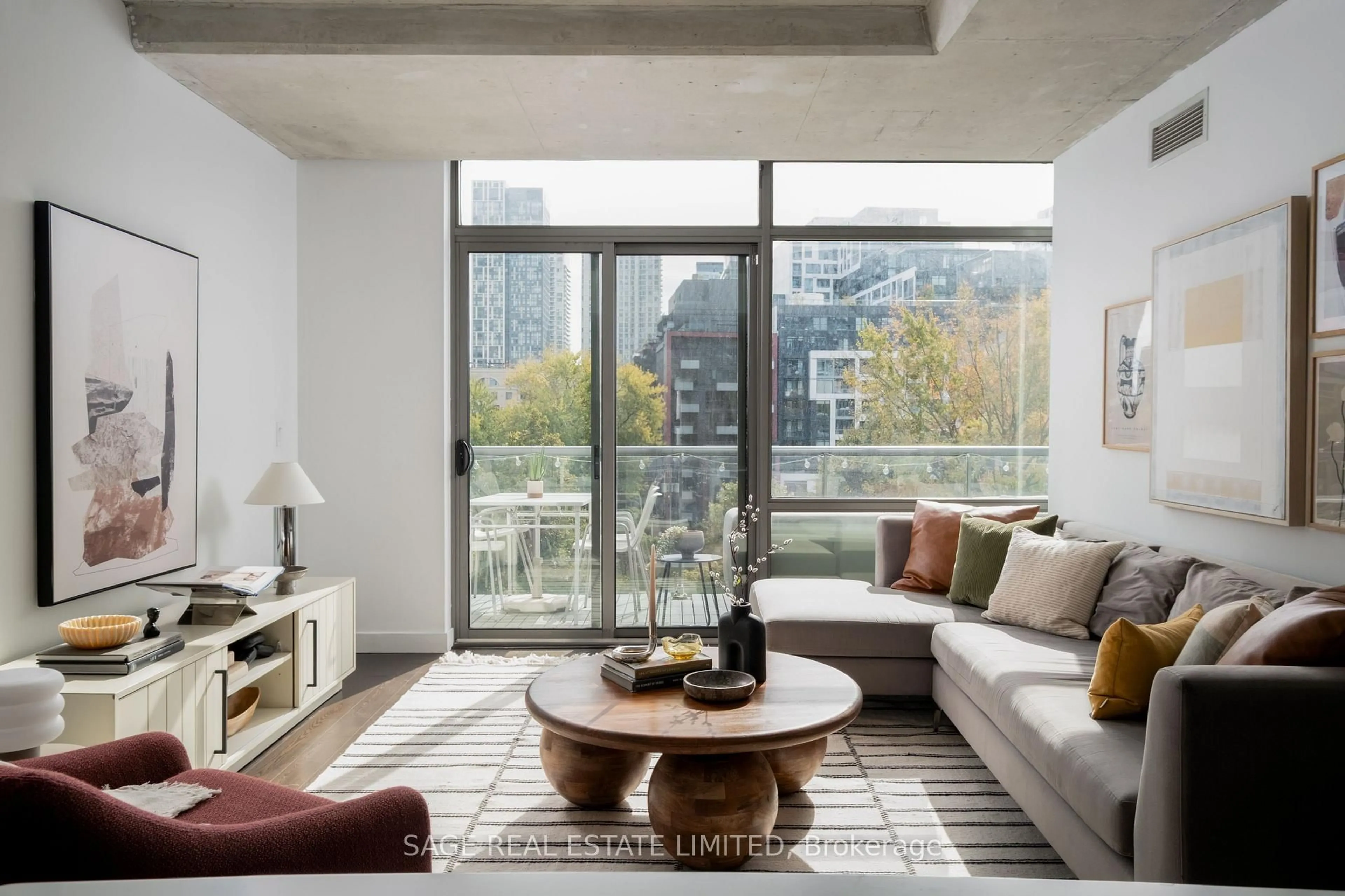Living room with furniture, cement floor for 55 Stewart St #633, Toronto Ontario M5V 2V1