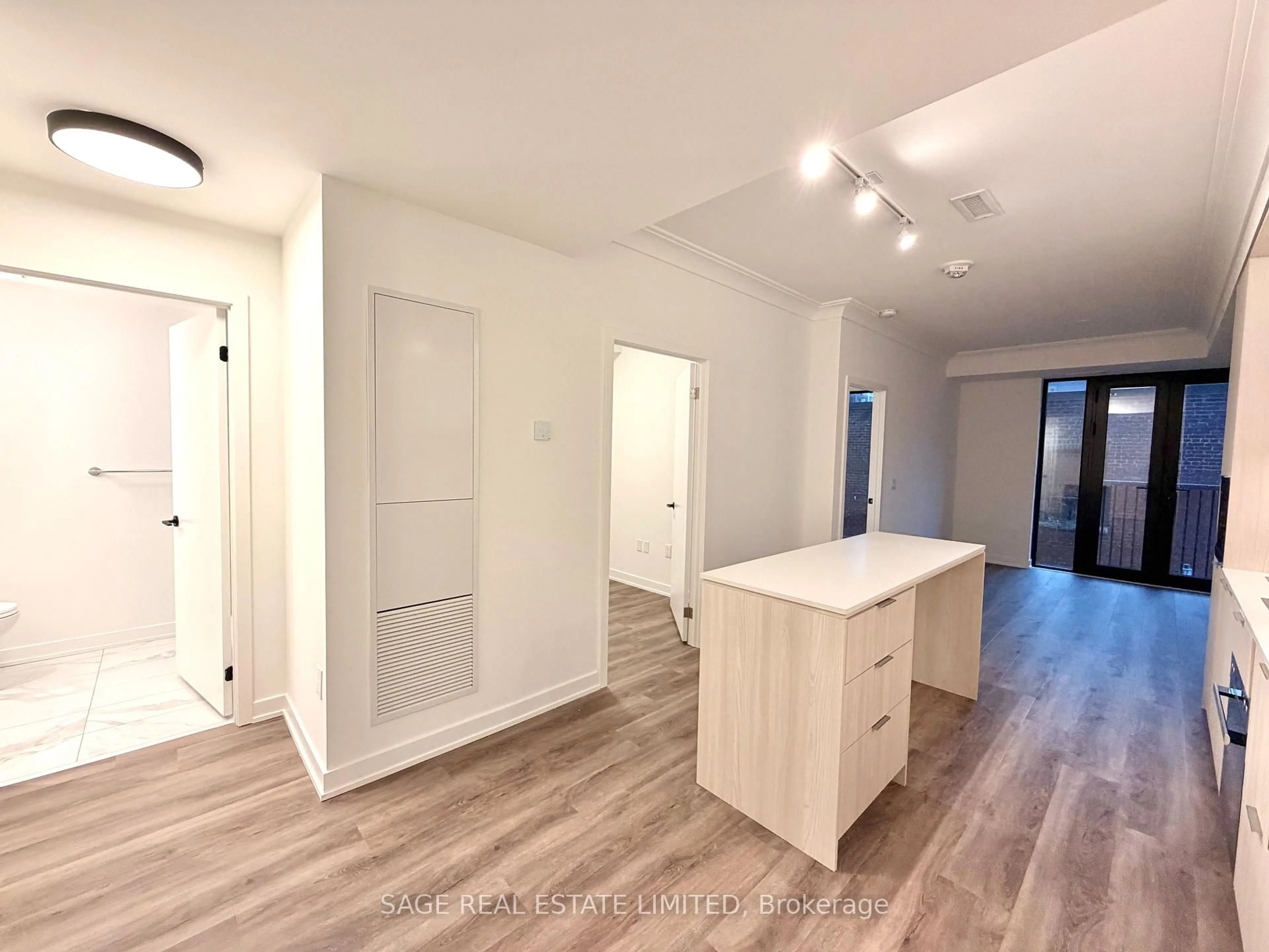 Open concept kitchen, wood/laminate floor for 123 Portland St #306, Toronto Ontario M5V 0V9