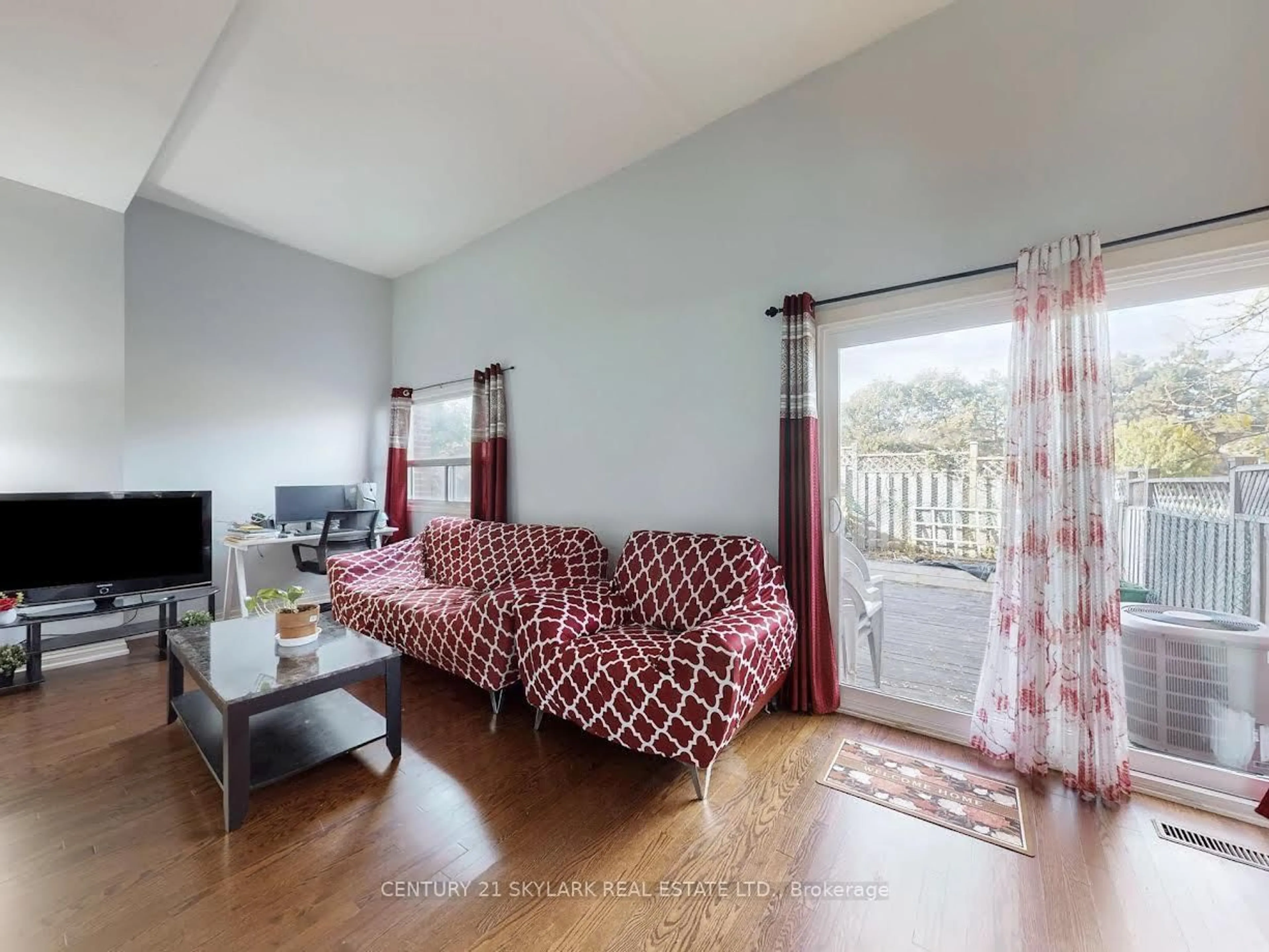 Living room with furniture, wood/laminate floor for 2 Dove Hawk Way, Toronto Ontario M2R 3M2