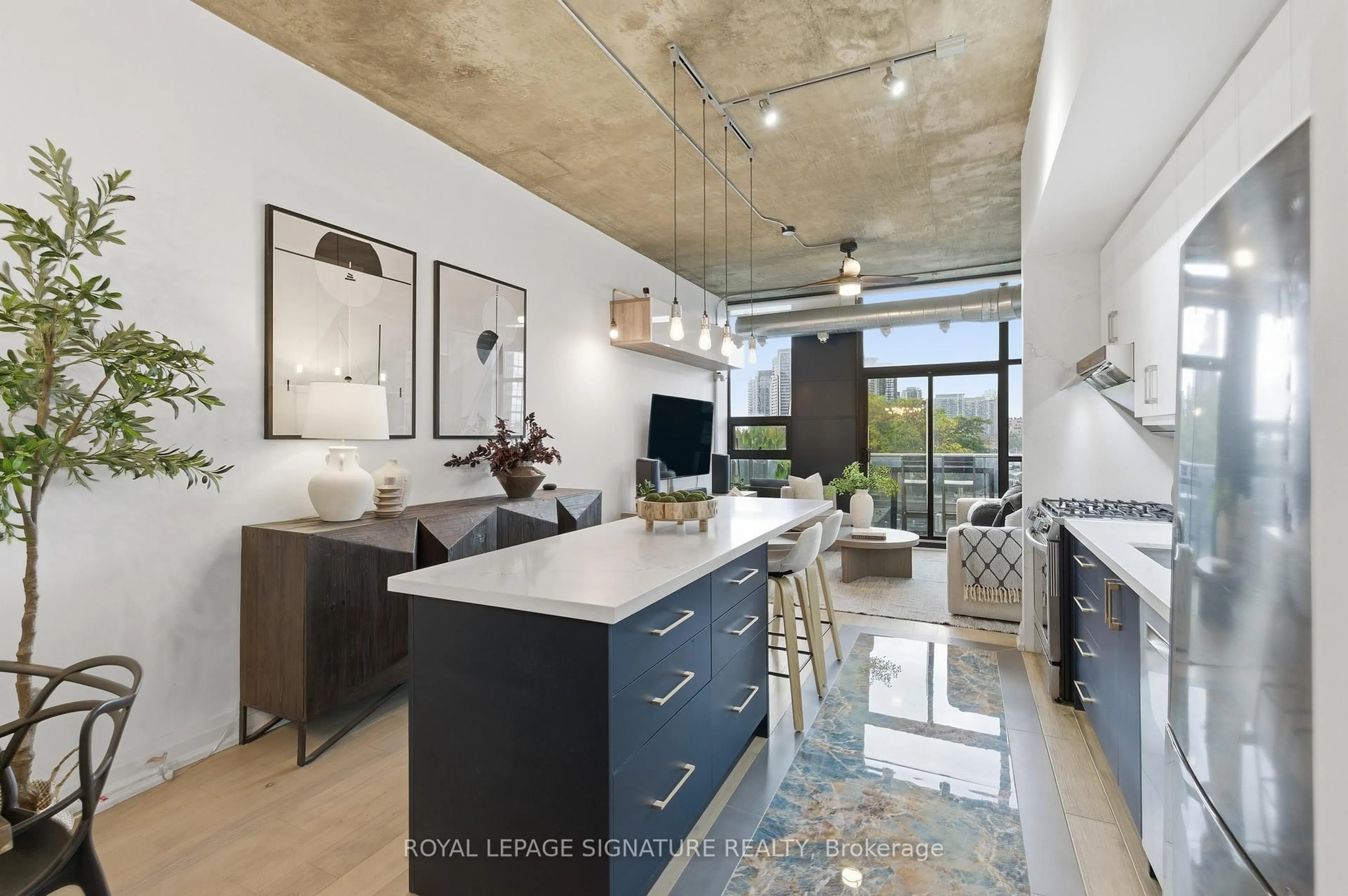 Open concept kitchen, cement floor for 60 Bathurst St #503, Toronto Ontario M5V 2P4