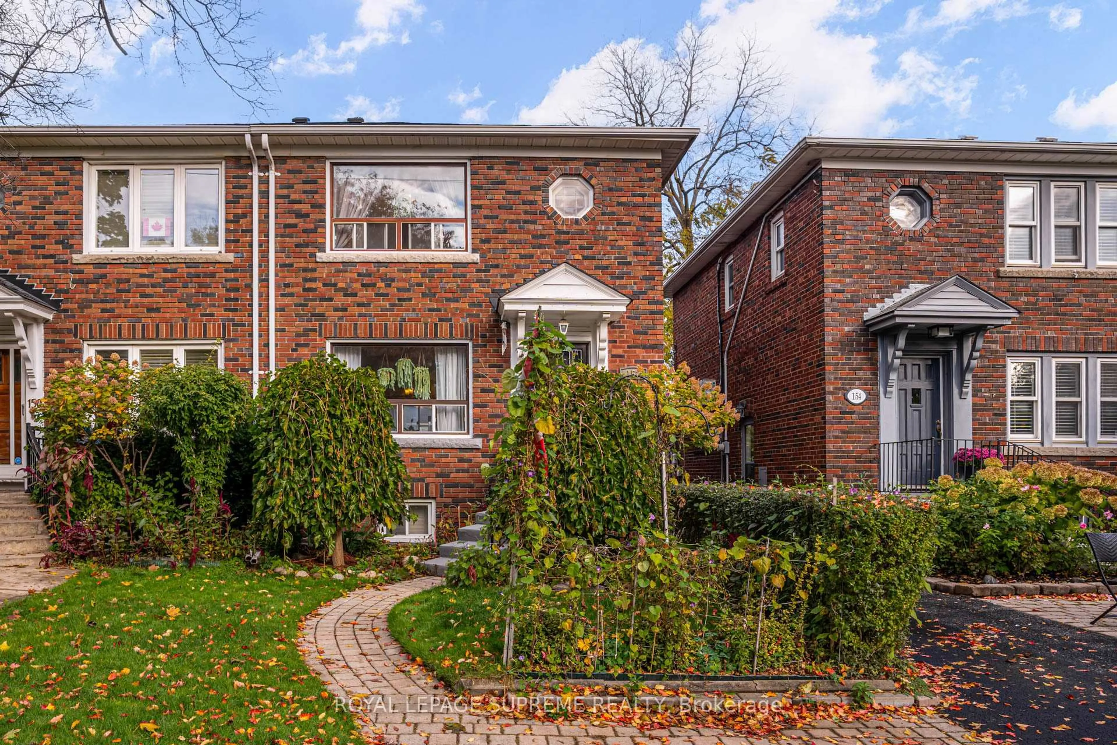 Home with brick exterior material, street for 152 Parkhurst Blvd, Toronto Ontario M4G 2E7