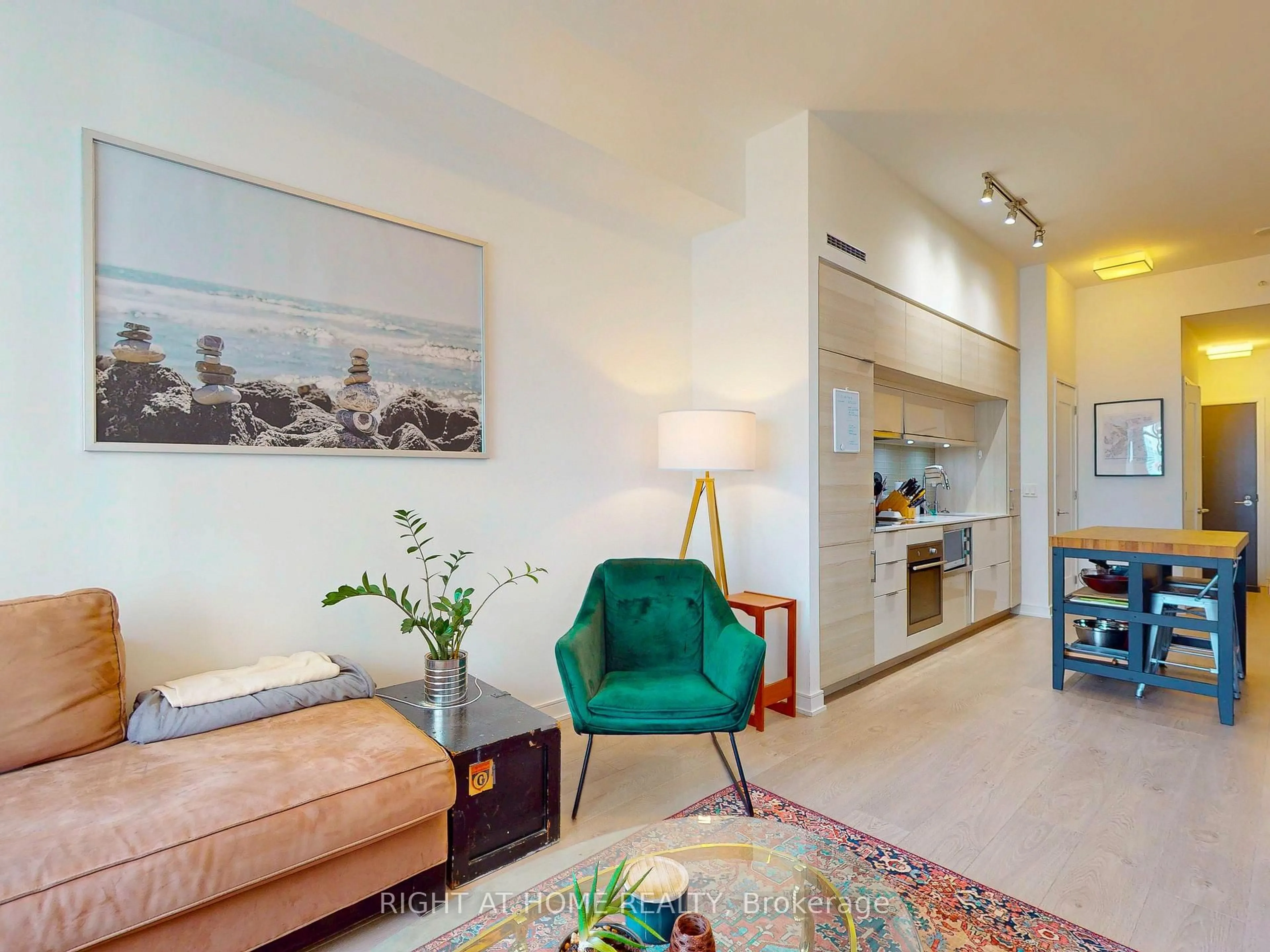 Living room with furniture, unknown for 88 Scott St #1904, Toronto Ontario M5E 0A9