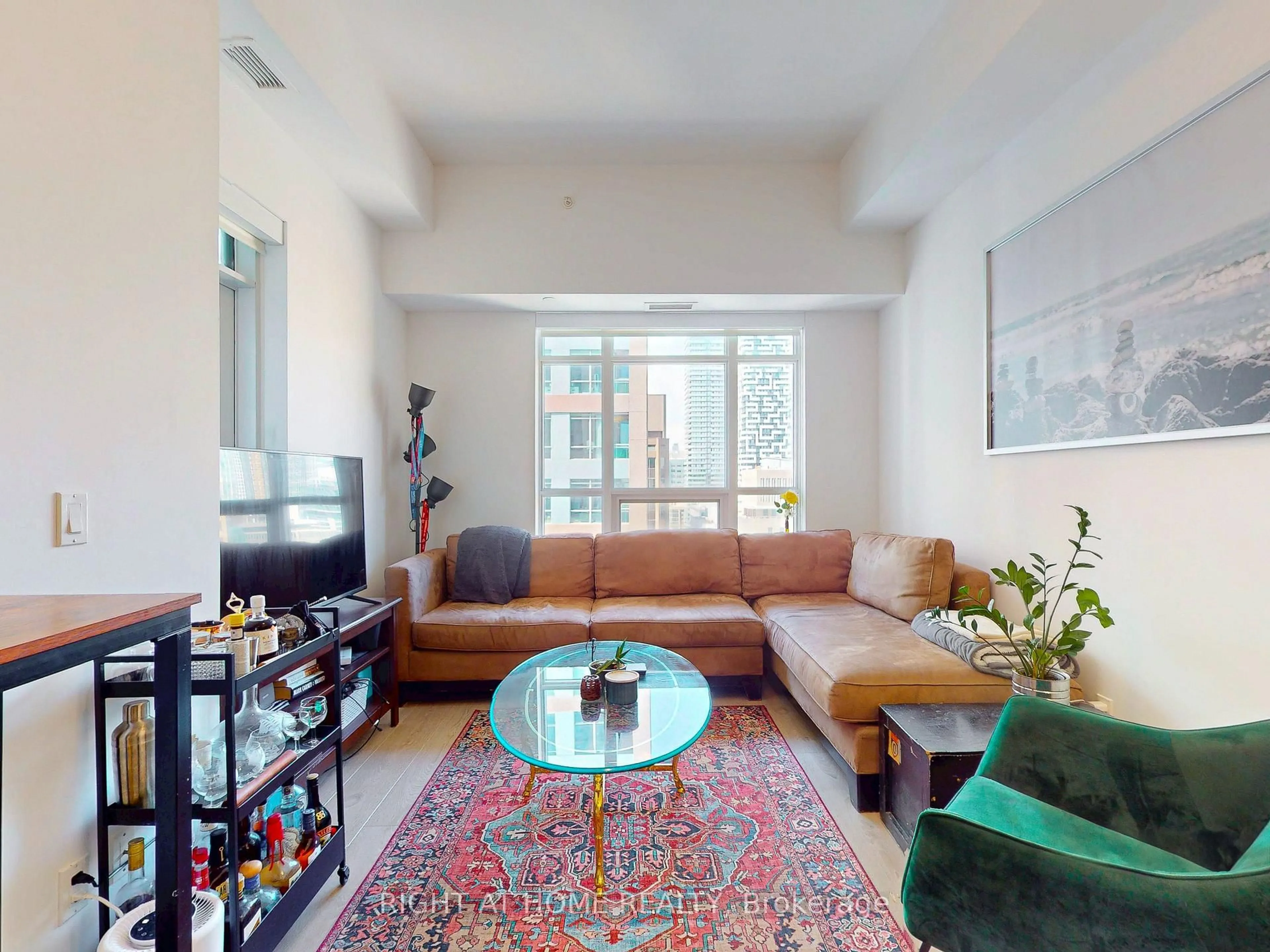 Living room with furniture, unknown for 88 Scott St #1904, Toronto Ontario M5E 0A9