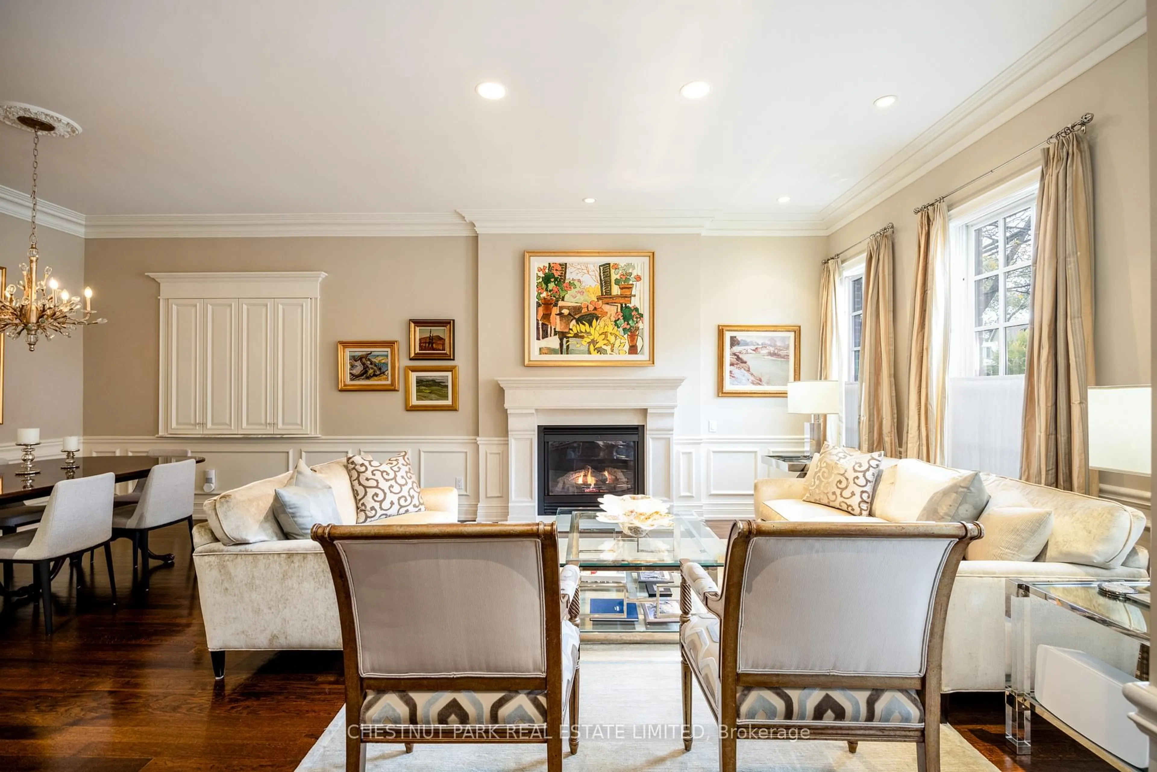 Living room with furniture, wood/laminate floor for 117 Davenport Rd, Toronto Ontario M5R 1H8