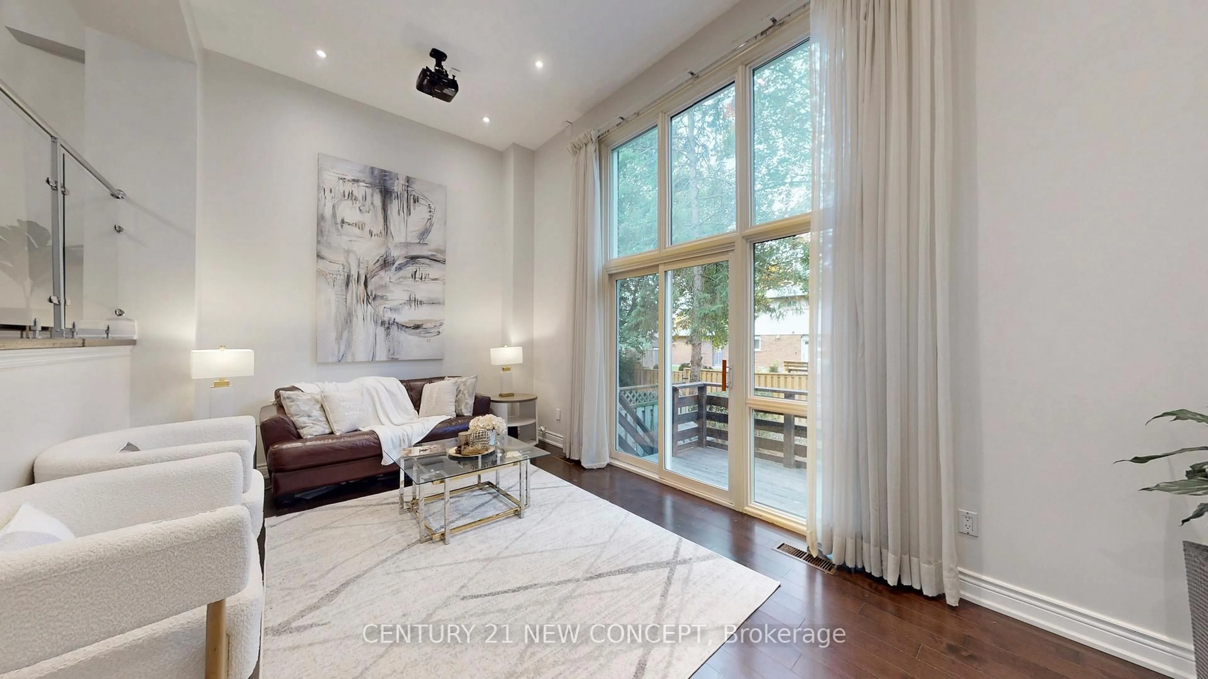 Living room with furniture, wood/laminate floor for 11 Stonedale Plwy, Toronto Ontario M3B 1W2