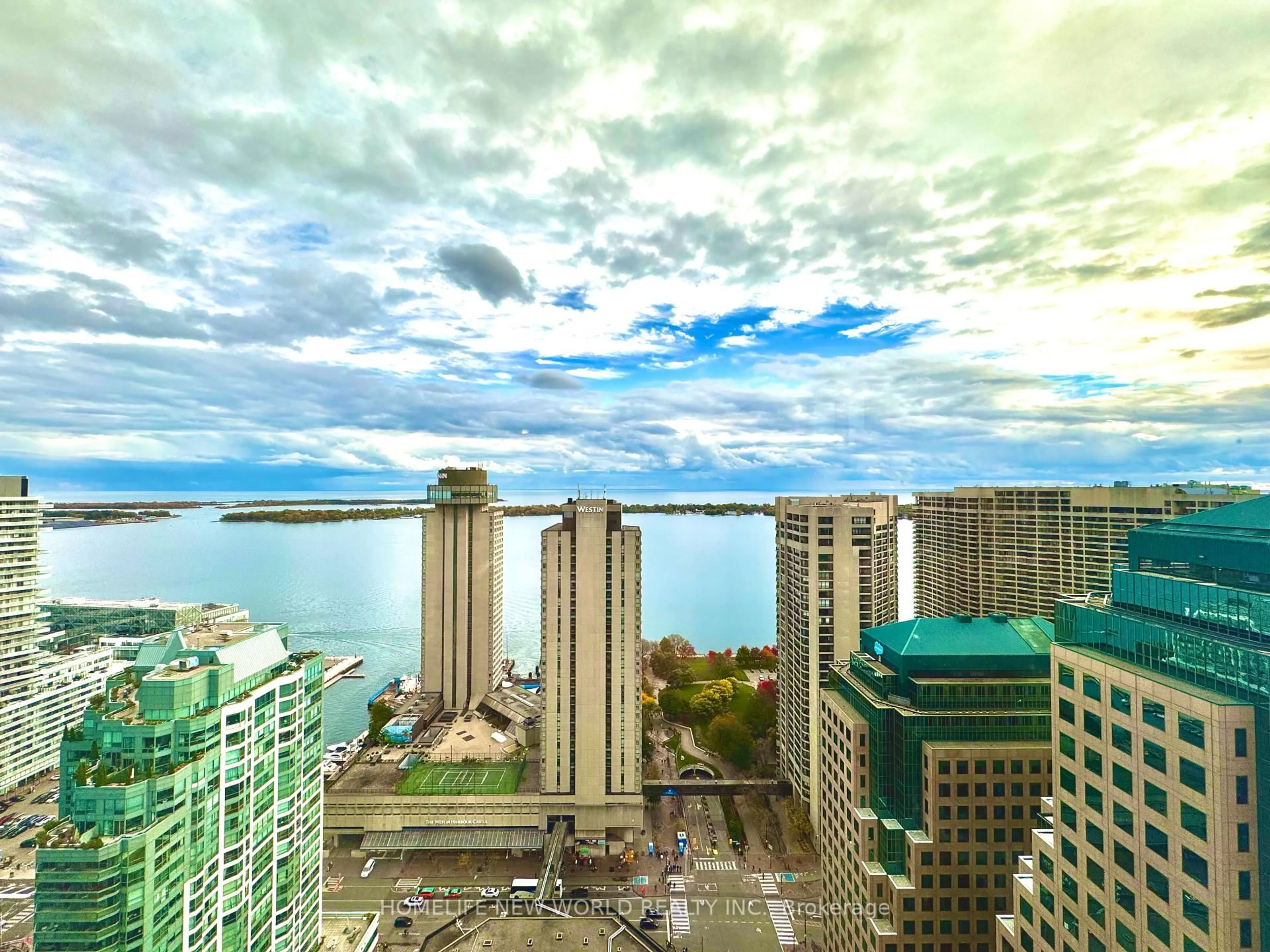 A pic from outside/outdoor area/front of a property/back of a property/a pic from drone, water/lake/river/ocean view for 33 BAY St #3812, Toronto Ontario M5J 2Z3