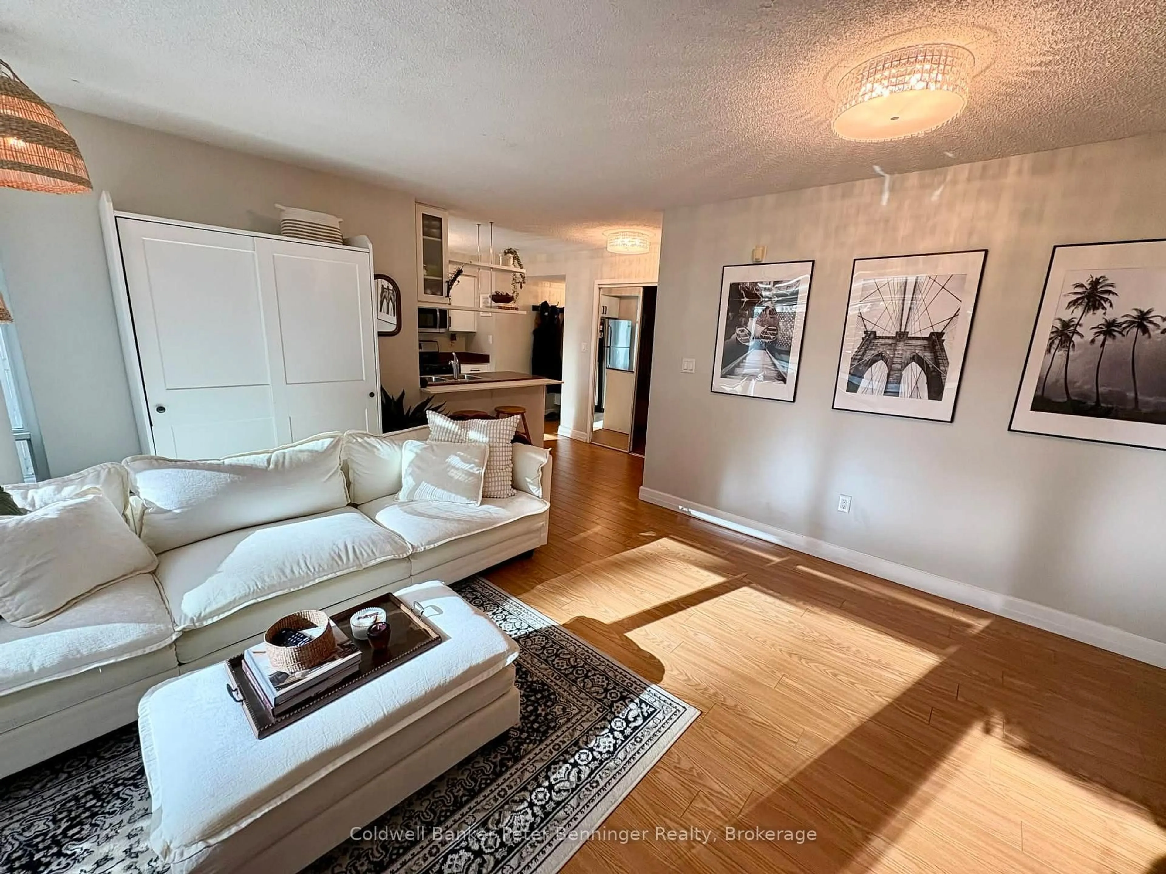Living room with furniture, wood/laminate floor for 10 Navy Wharf Crt #203, Toronto Ontario M5V 3V2