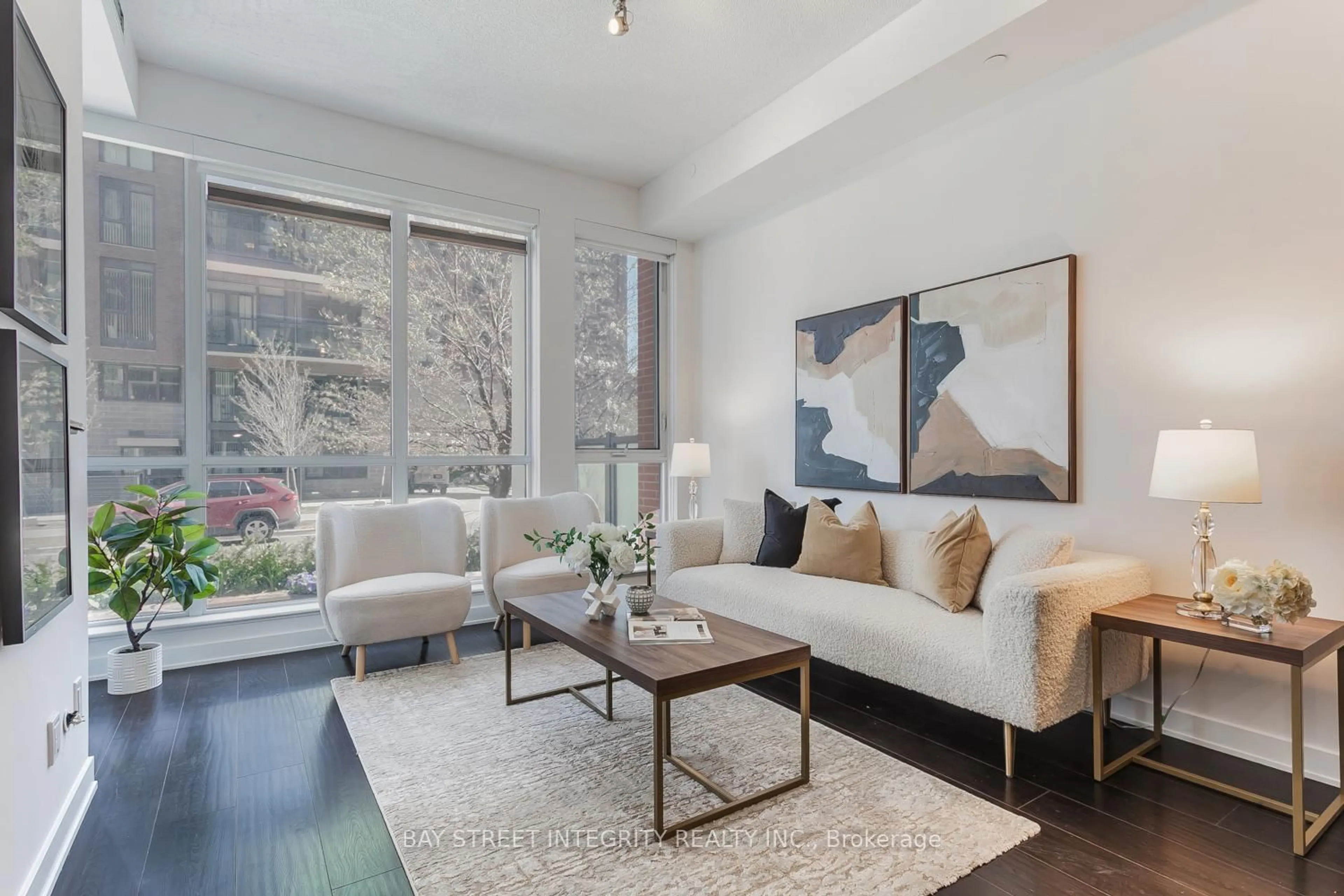 Living room with furniture, unknown for 55 Regent Park Blvd #107, Toronto Ontario M5A 0C2