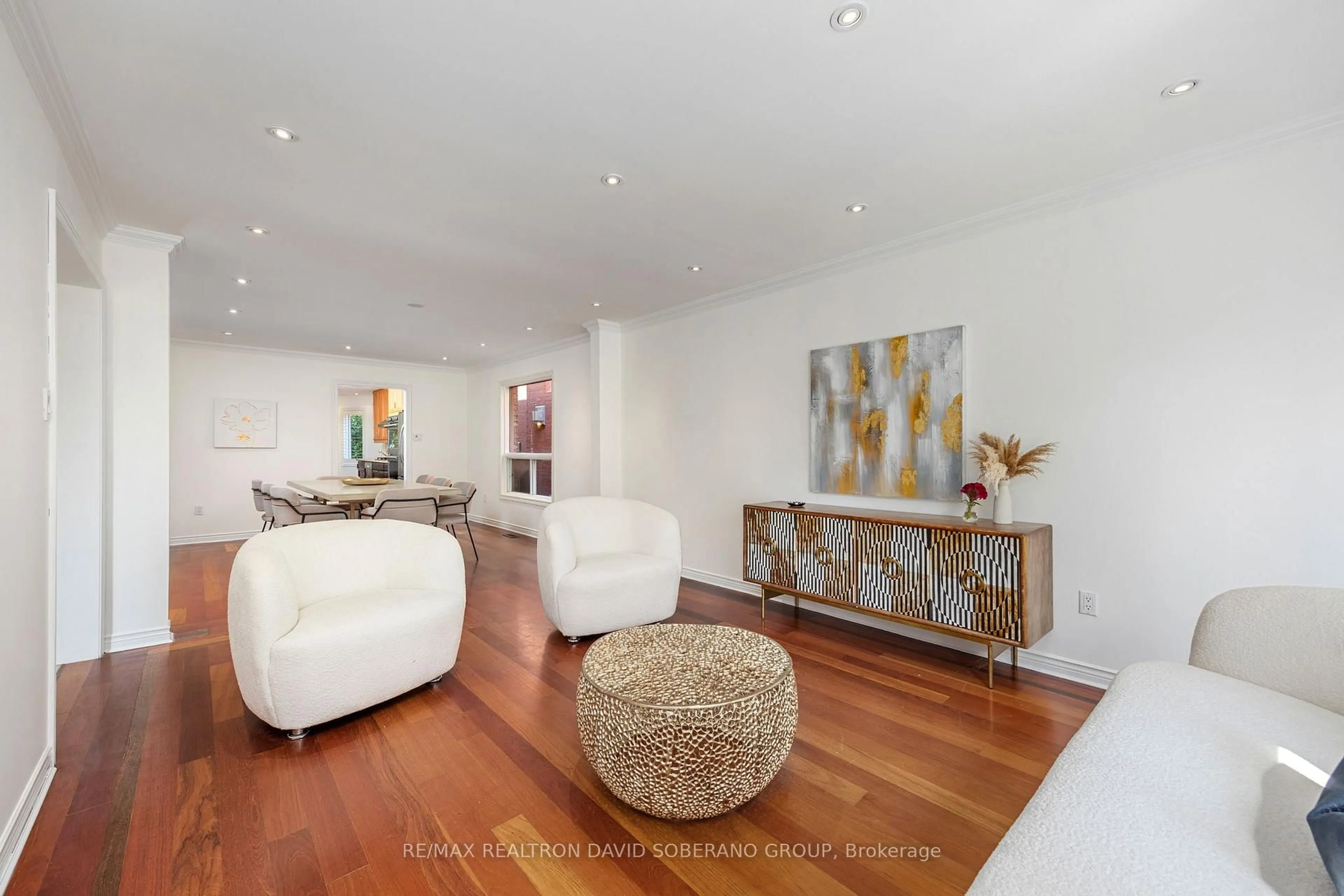 Living room with furniture, wood/laminate floor for 10 Tillingham Keep, Toronto Ontario M3H 6A2