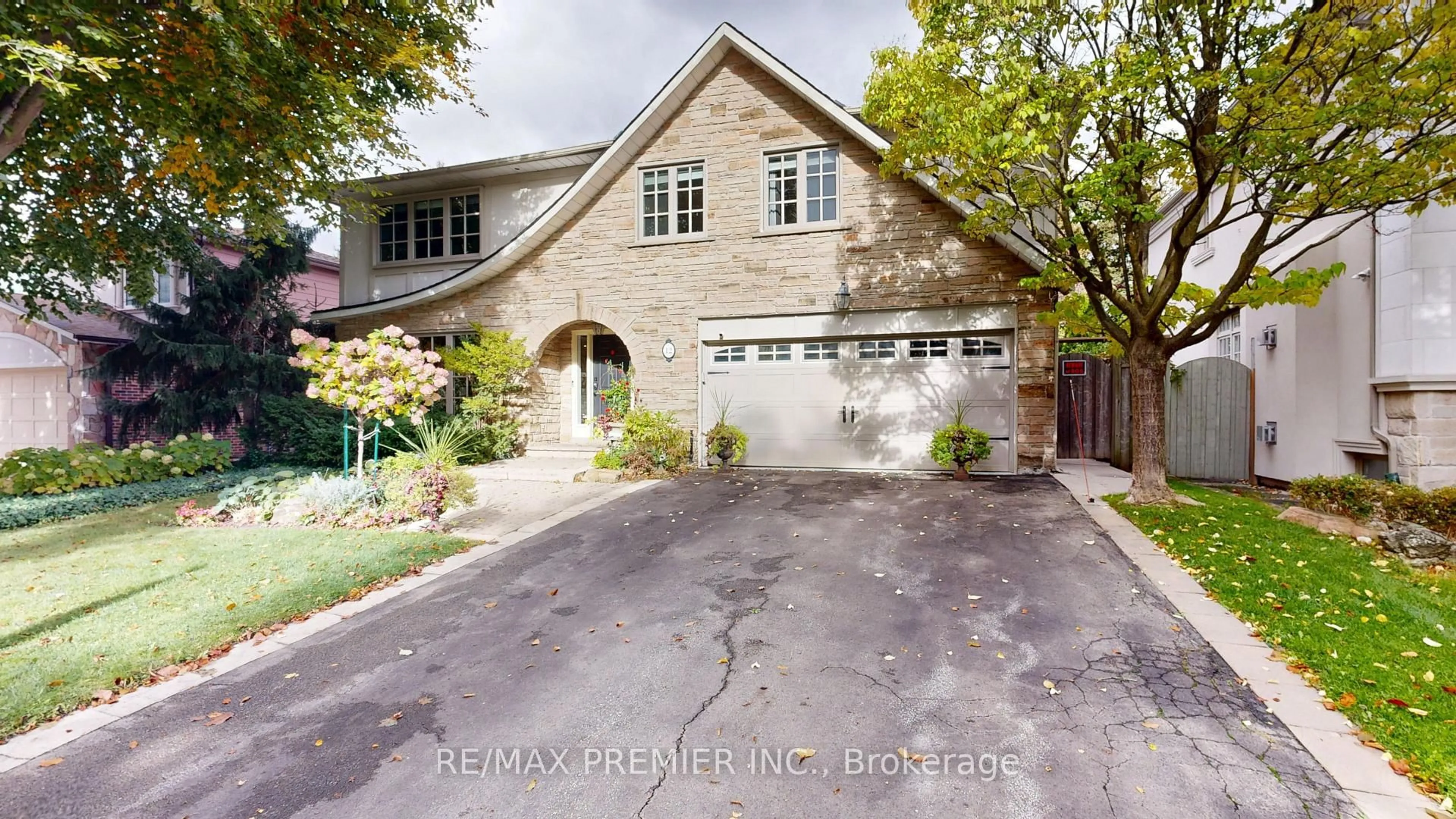Home with brick exterior material, street for 12 Chipstead Rd, Toronto Ontario M3B 3E6
