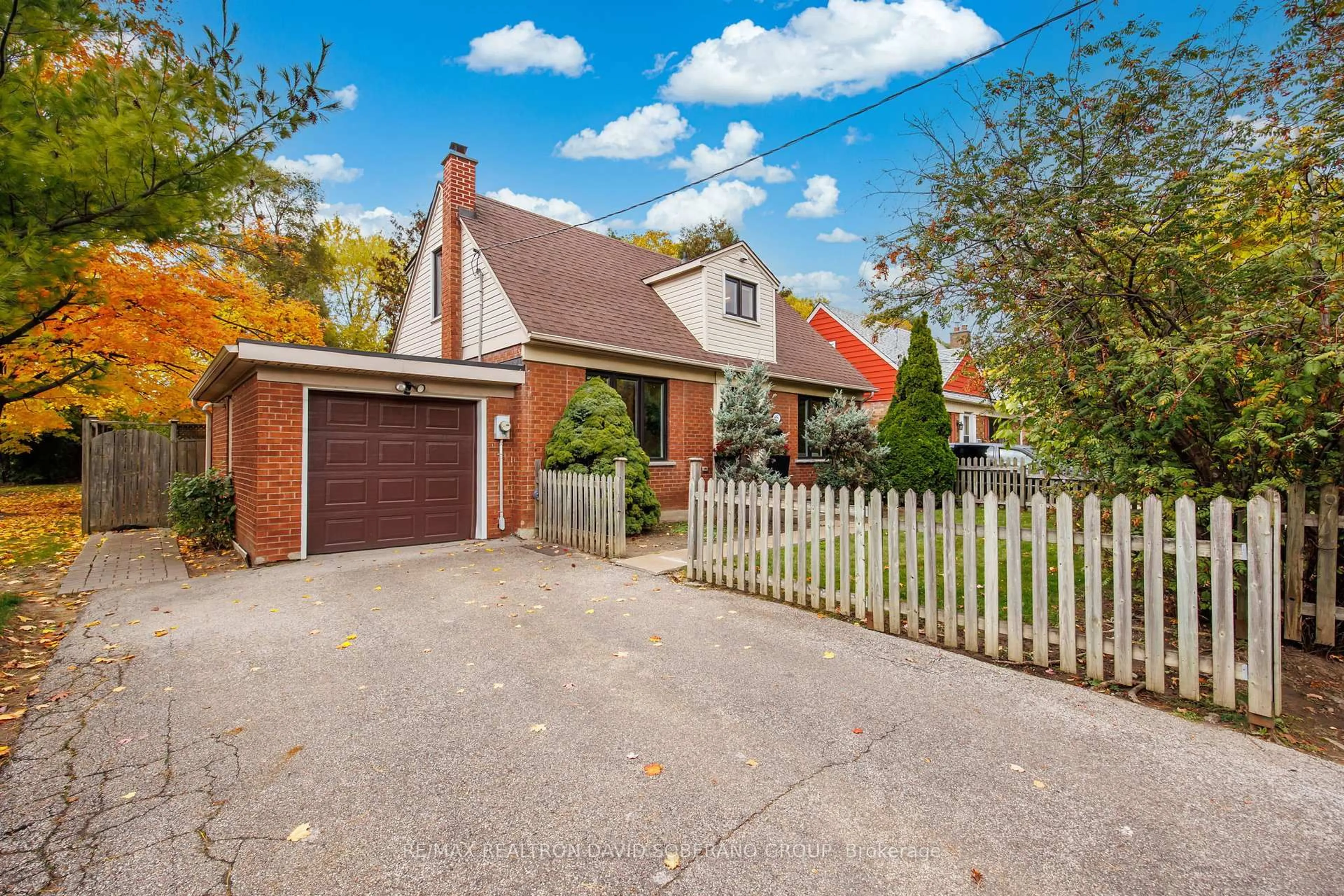 Home with brick exterior material, street for 28 Touraine Ave, Toronto Ontario M3H 1R1