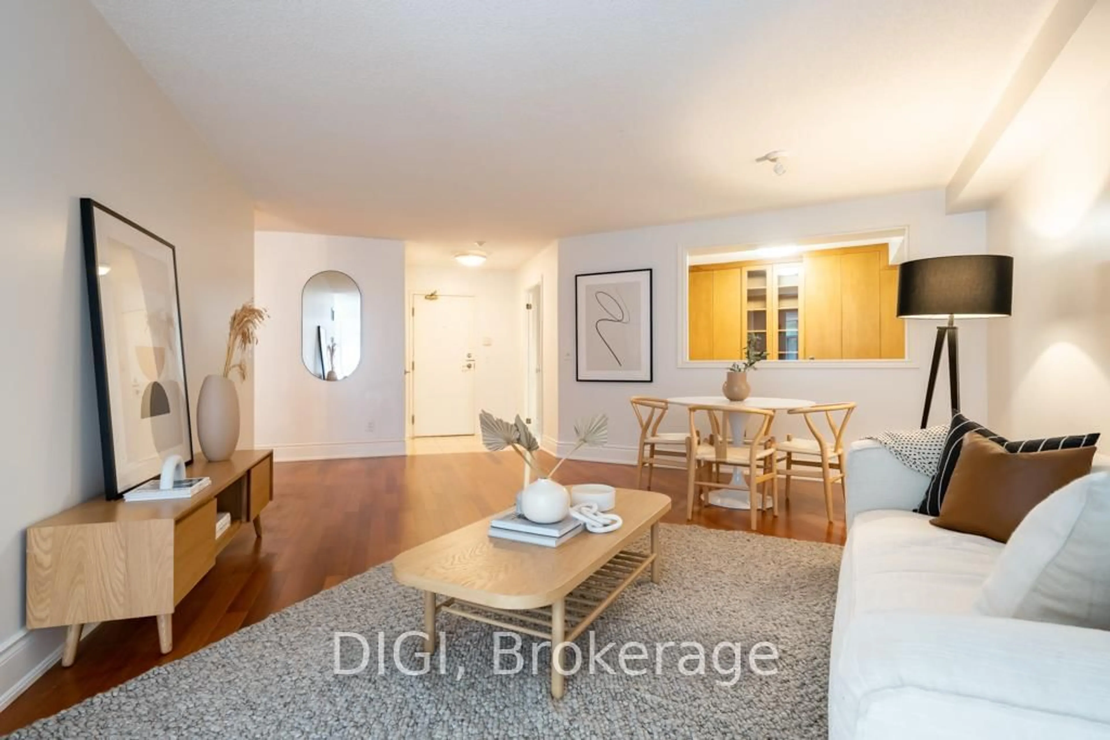 Living room with furniture, wood/laminate floor for 75 York Mills Rd #406, Toronto Ontario M2P 2E7
