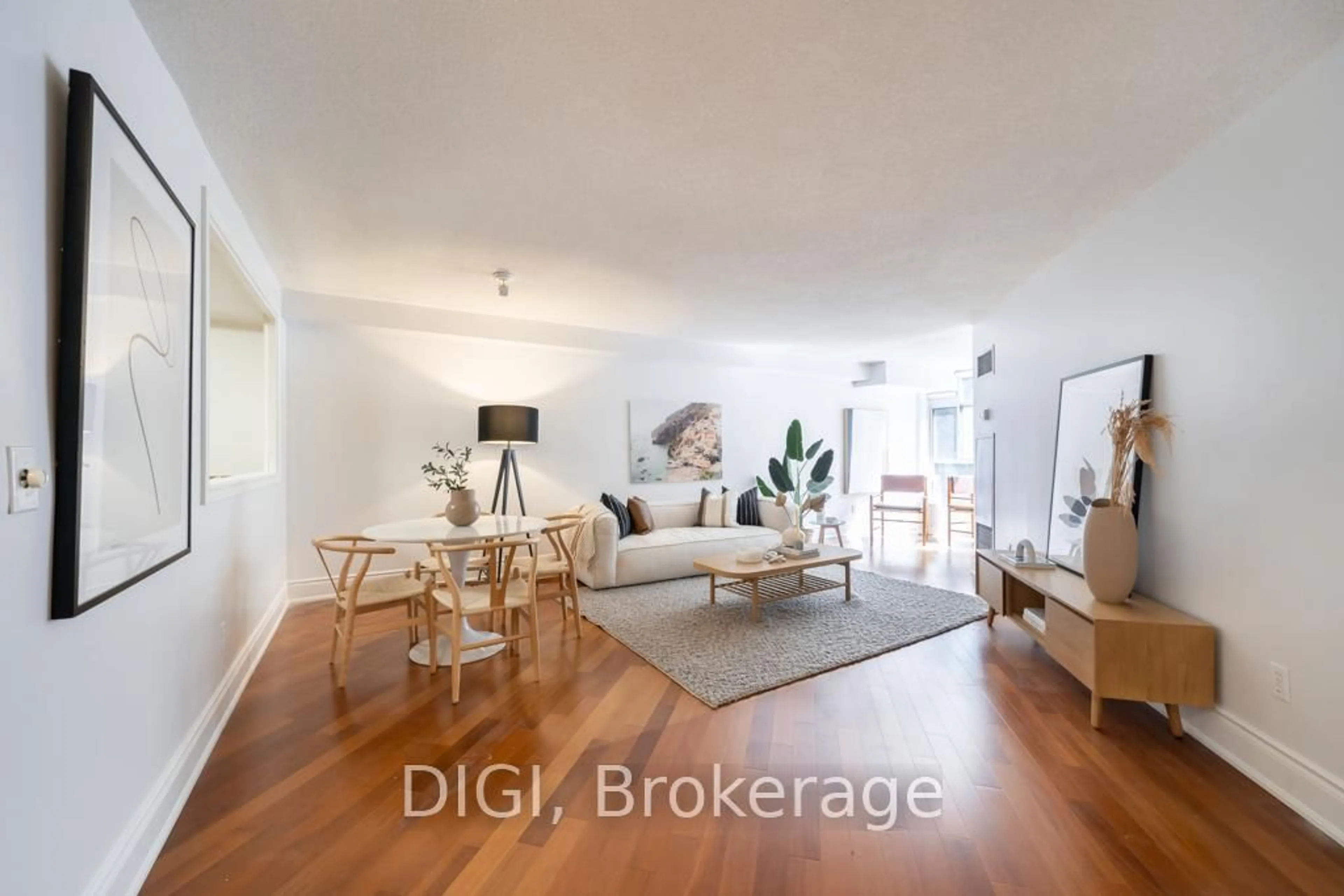 Living room with furniture, wood/laminate floor for 75 York Mills Rd #406, Toronto Ontario M2P 2E7